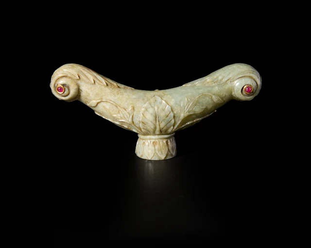 A fine ruby inset elbow-crutch handle