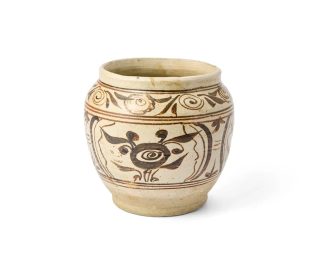 A Chinese Cizhou slip-painted jar Yuan dynasty Painted in...