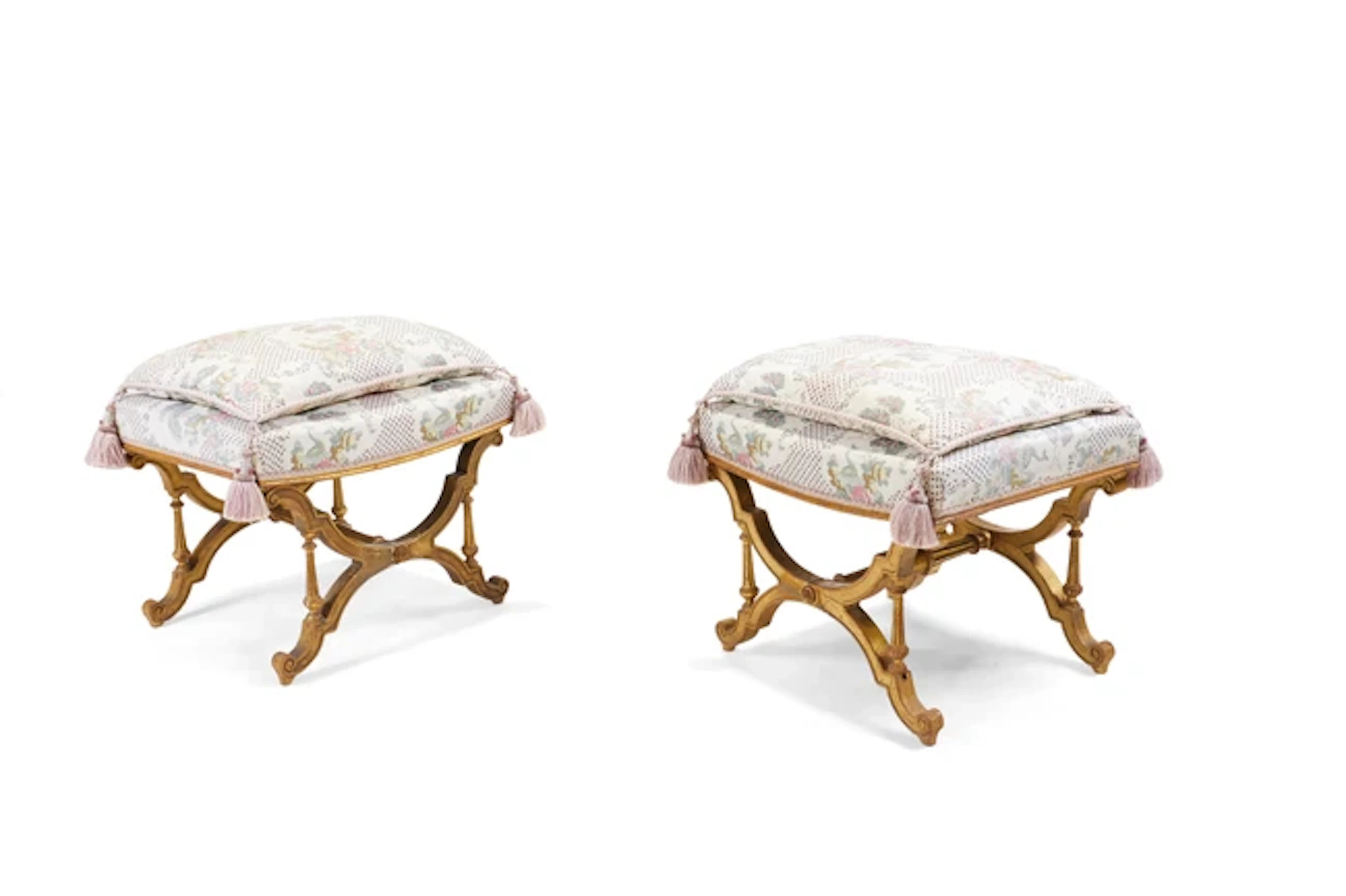 A pair of French giltwood X-frame stools