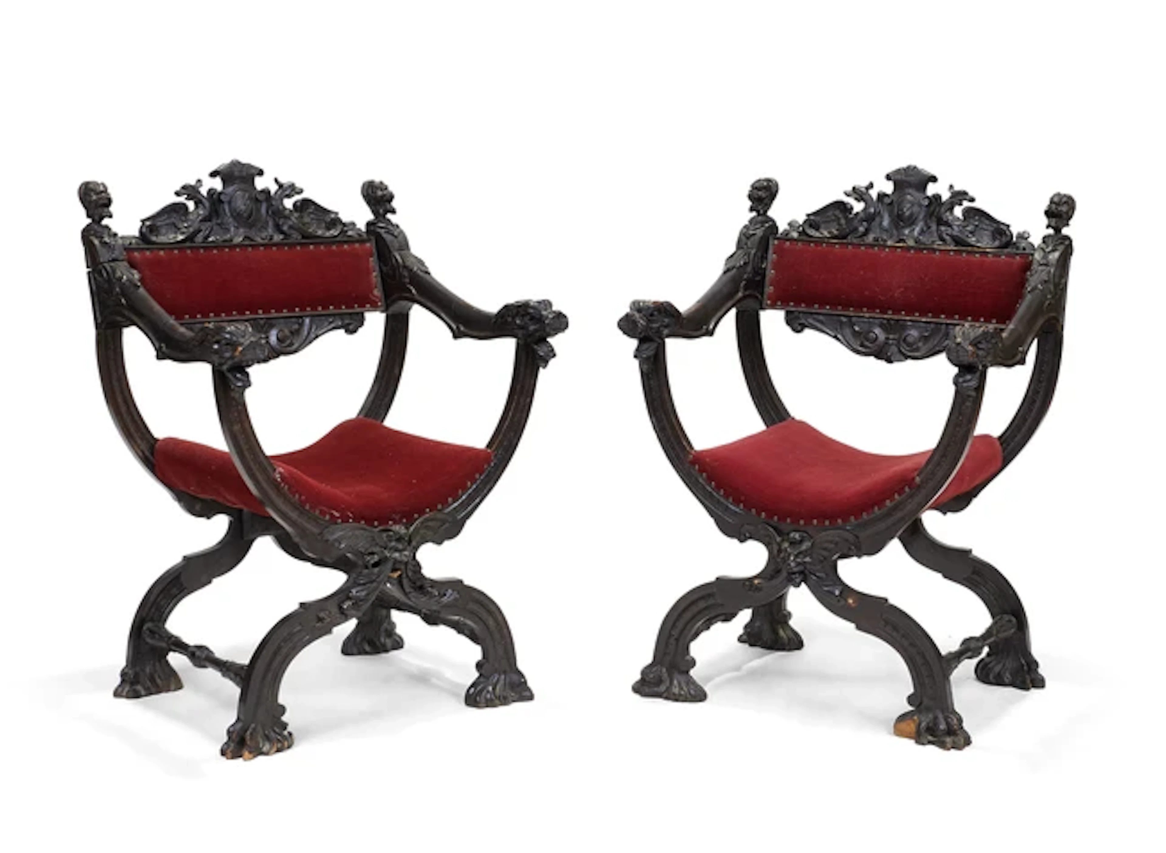 A pair of Italian carved beech Savonarola chairs