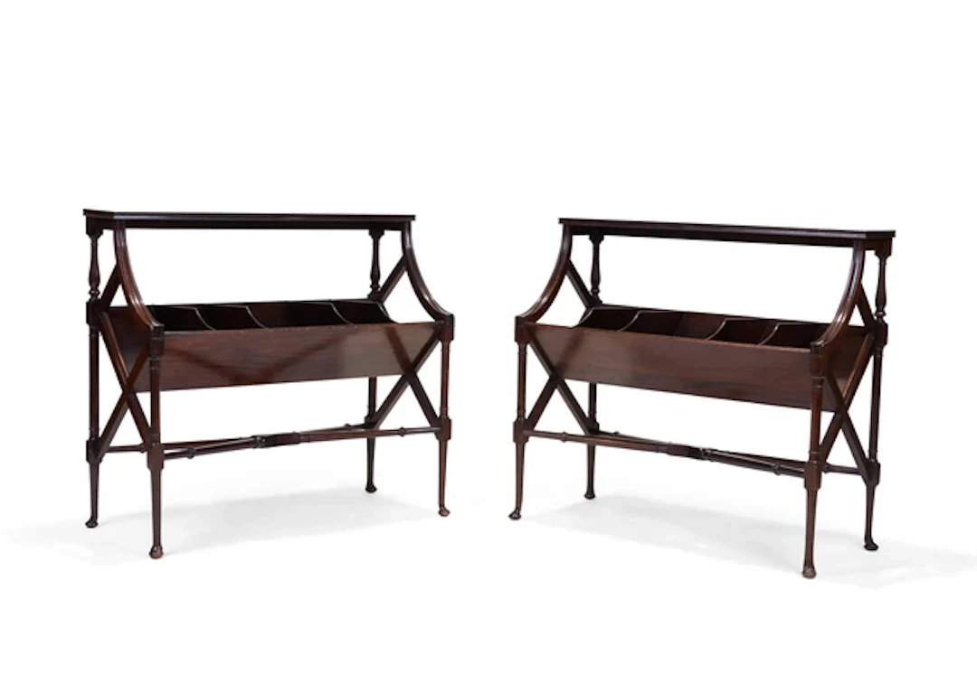A pair of Edwardian mahogany book troughs