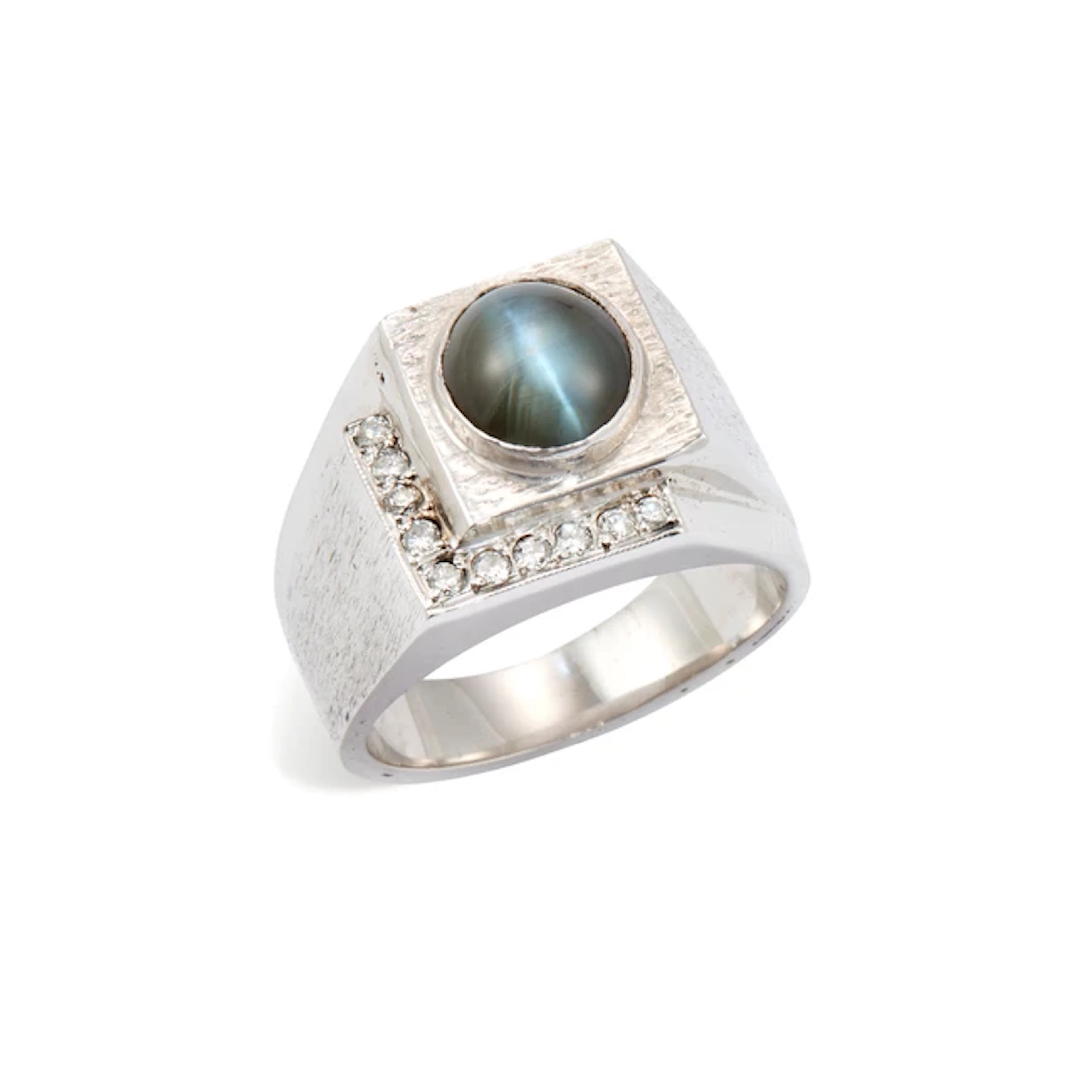 A cat's eye chrysoberyl and diamond ring
