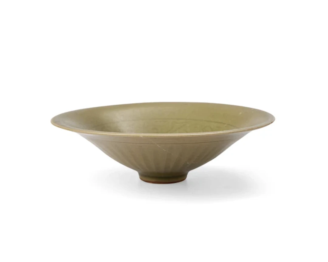 A Chinese Yaozhou celadon conical bowl Jin dynasty The...