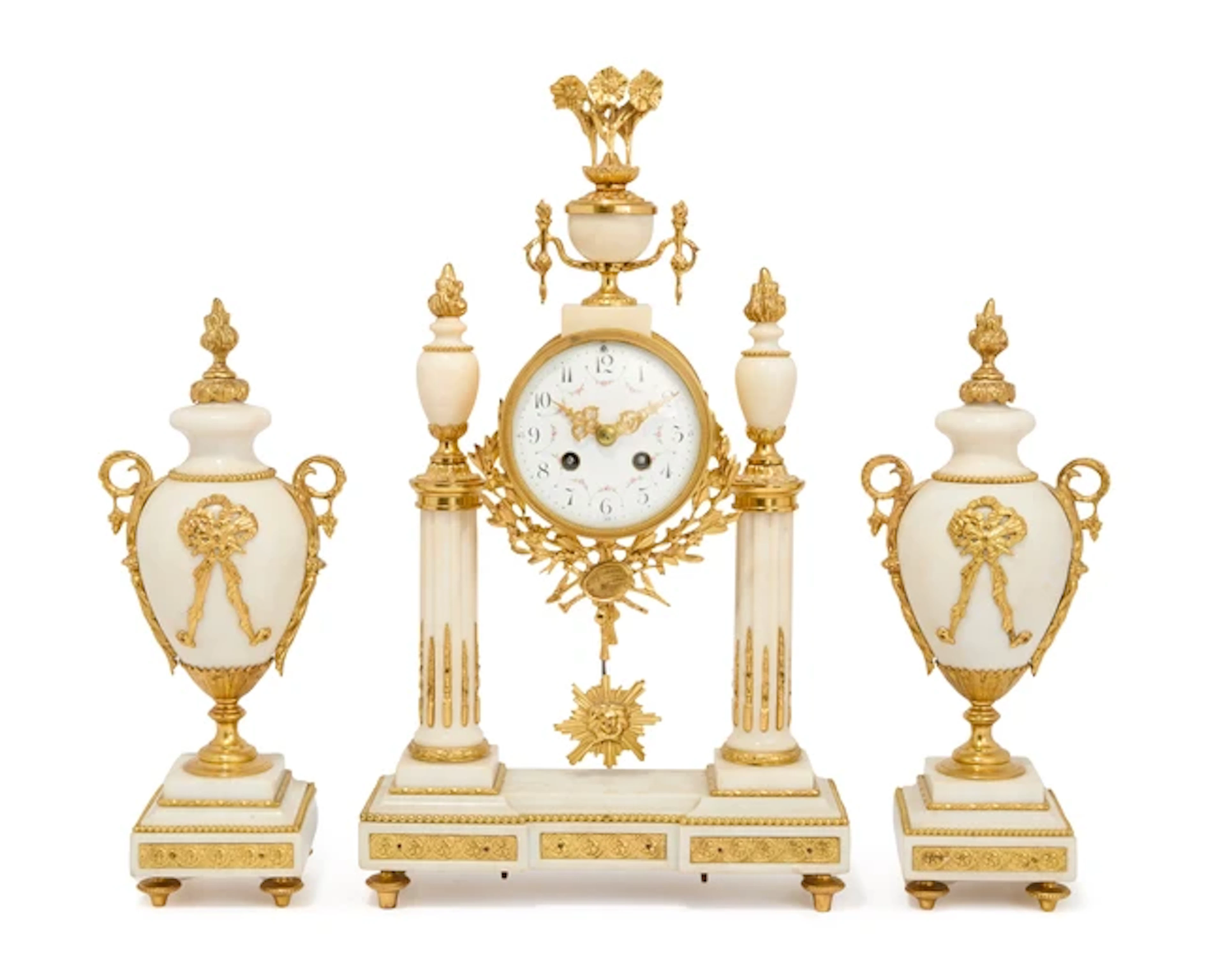 A French gilt-bronze mounted white marble portico clock garniture