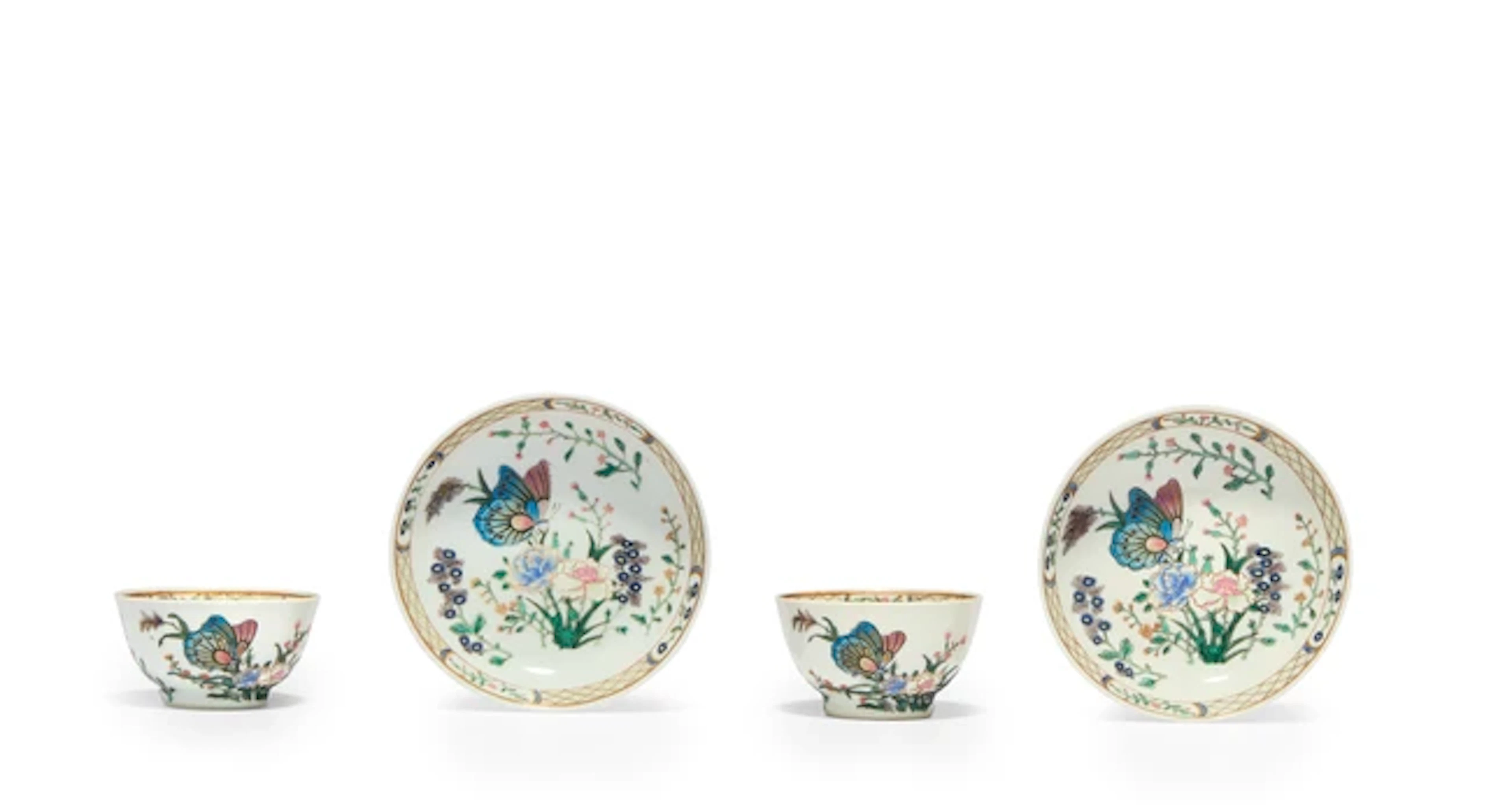 A pair of Chinese famille rose 'butterflies' cups and saucers Qing dynasty