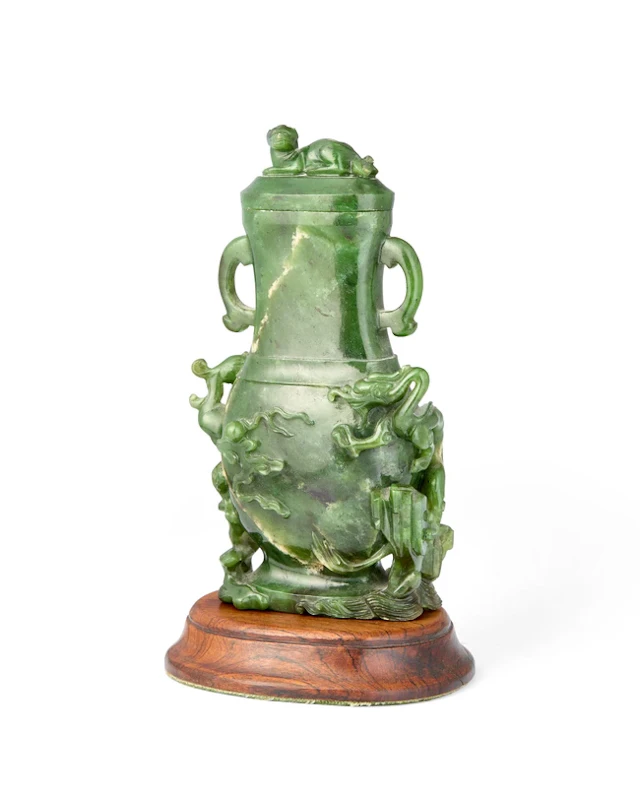 A Chinese spinach green jade 'dragon and phoenix' vase and cover Qing dynasty