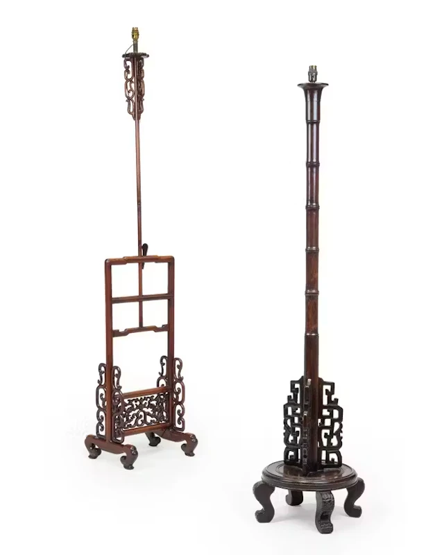 Two Chinese wood lamp stands 20th century One with round...