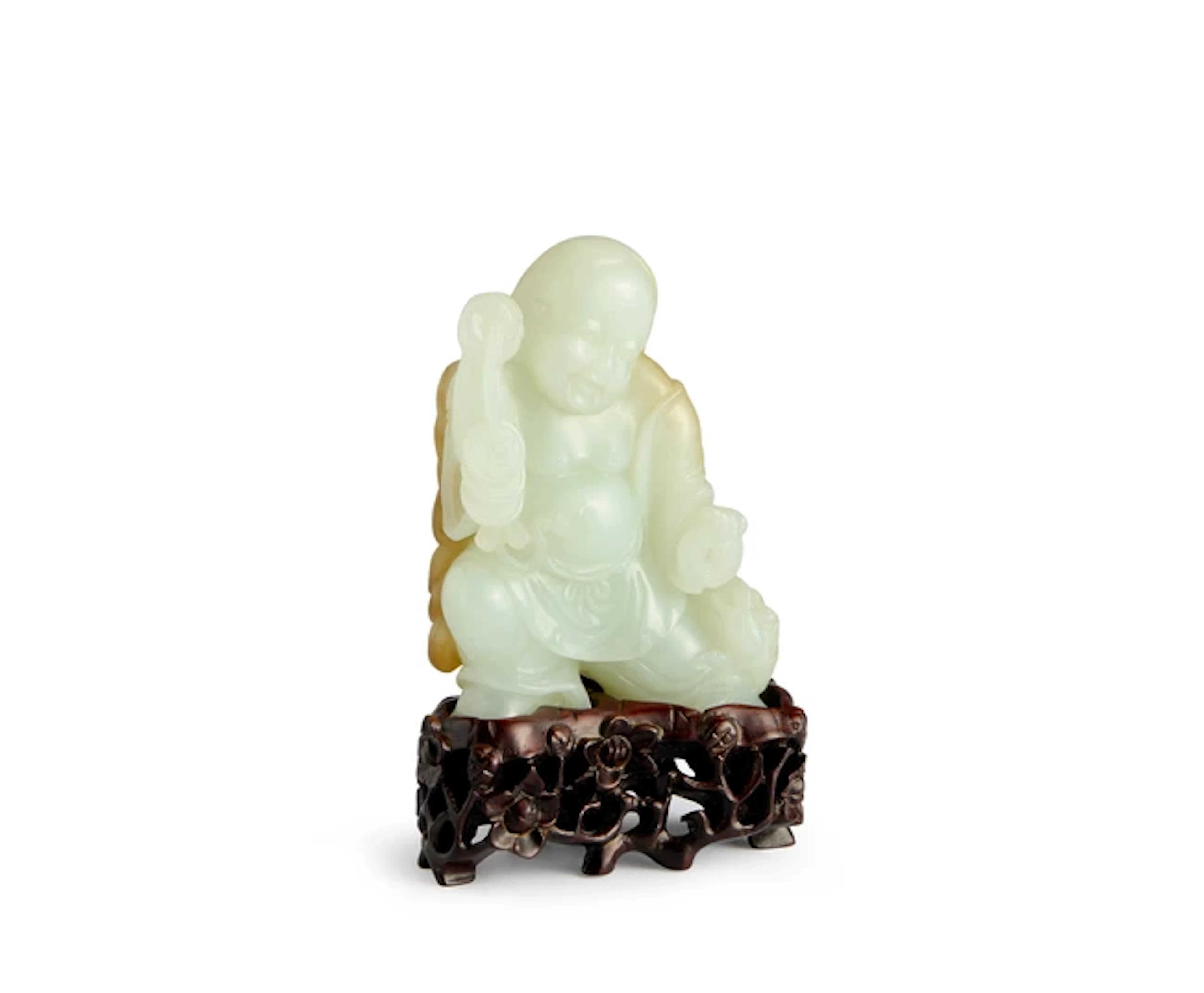 A Chinese pale green and russet jade carving of Liu Hai...