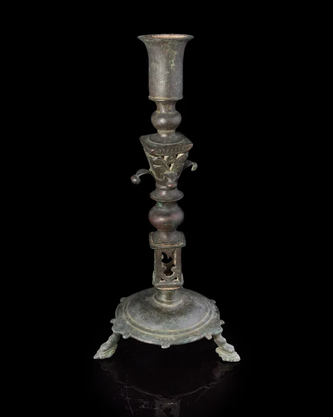 An Umayyad or Fatimid bronze candlestand