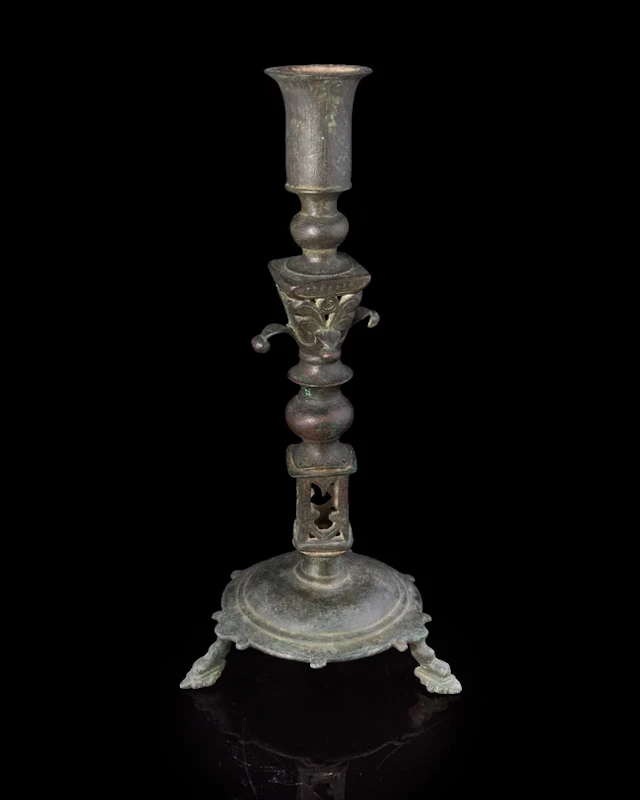 An Umayyad or Fatimid bronze candlestand