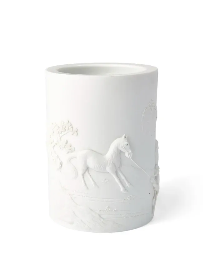 A Chinese carved white biscuit porcelain brushpot