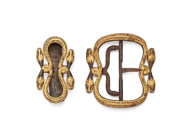 A Javanese parcel gilt iron belt buckle and attachment...