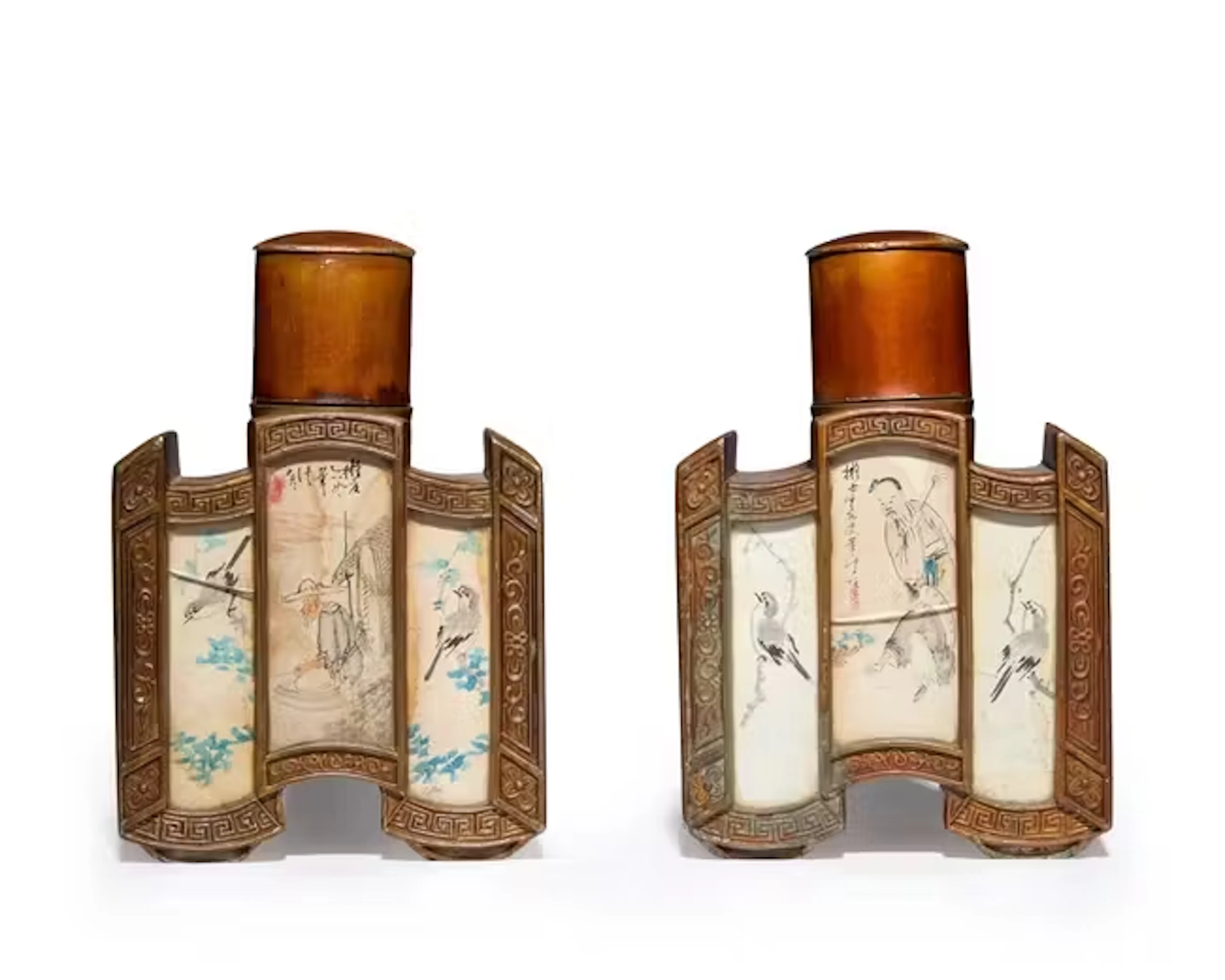 A pair of Chinese lacquered pewter tea canisters with...