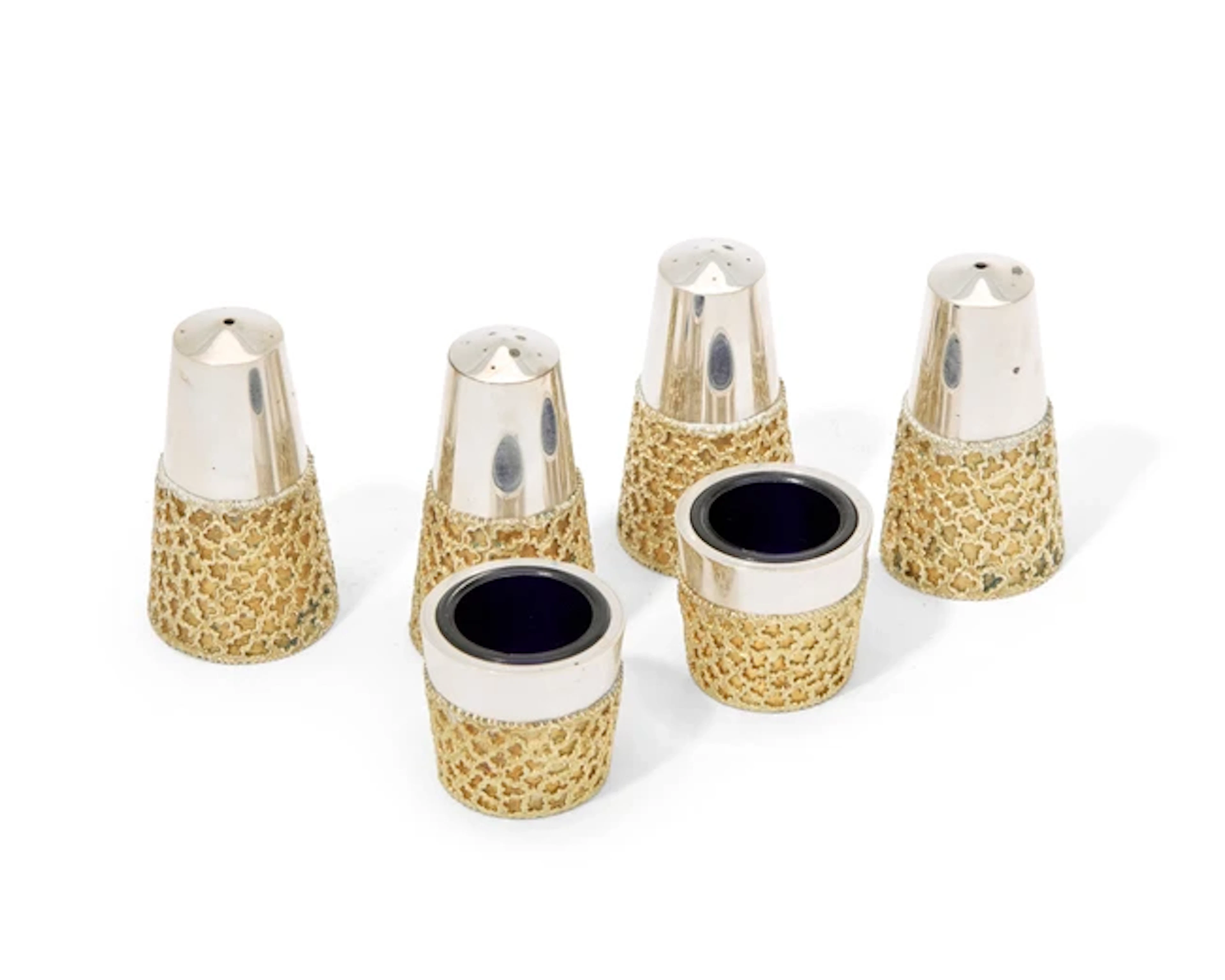 Two parcel gilt silver condiment sets
