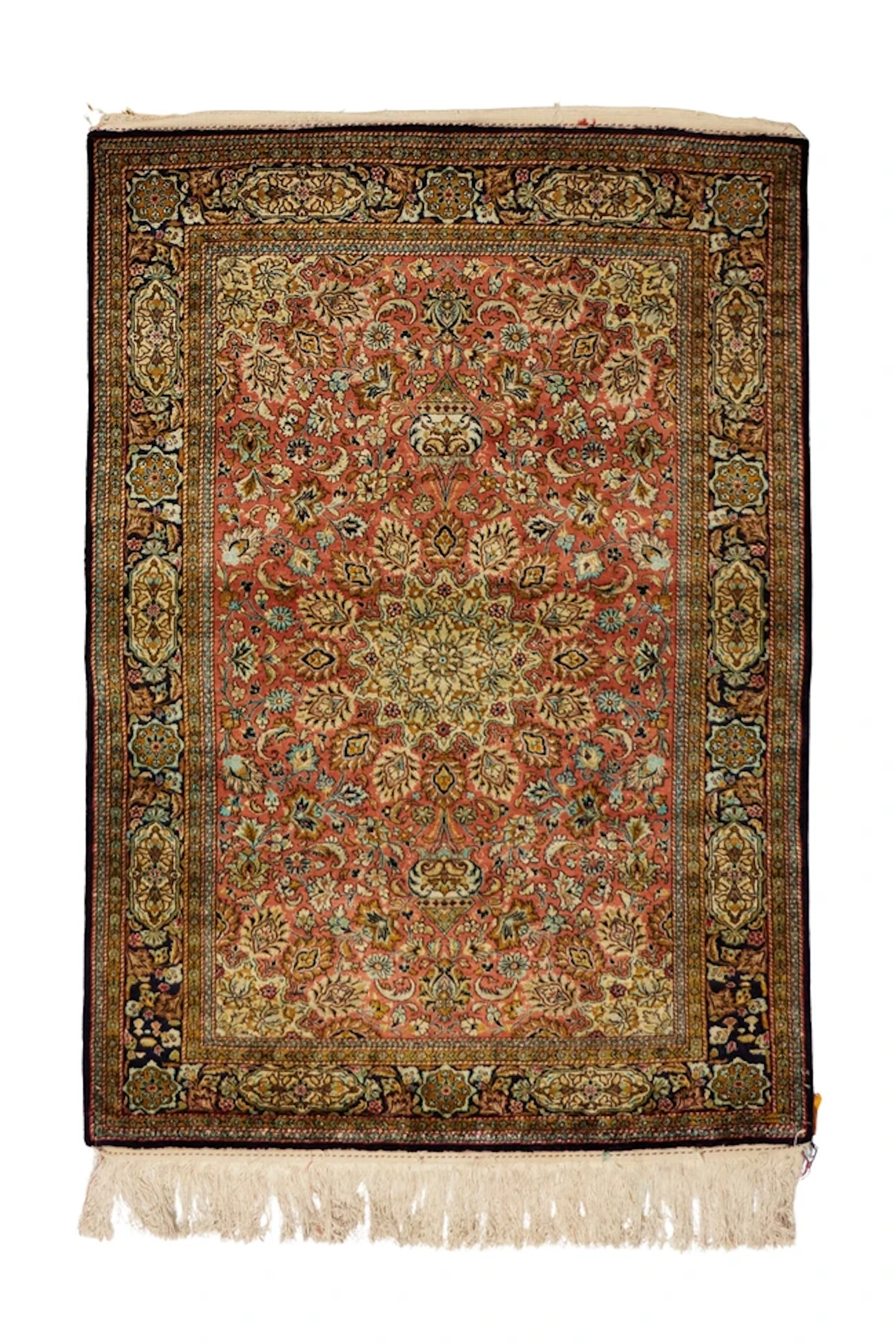 A Persian silk Qum rug