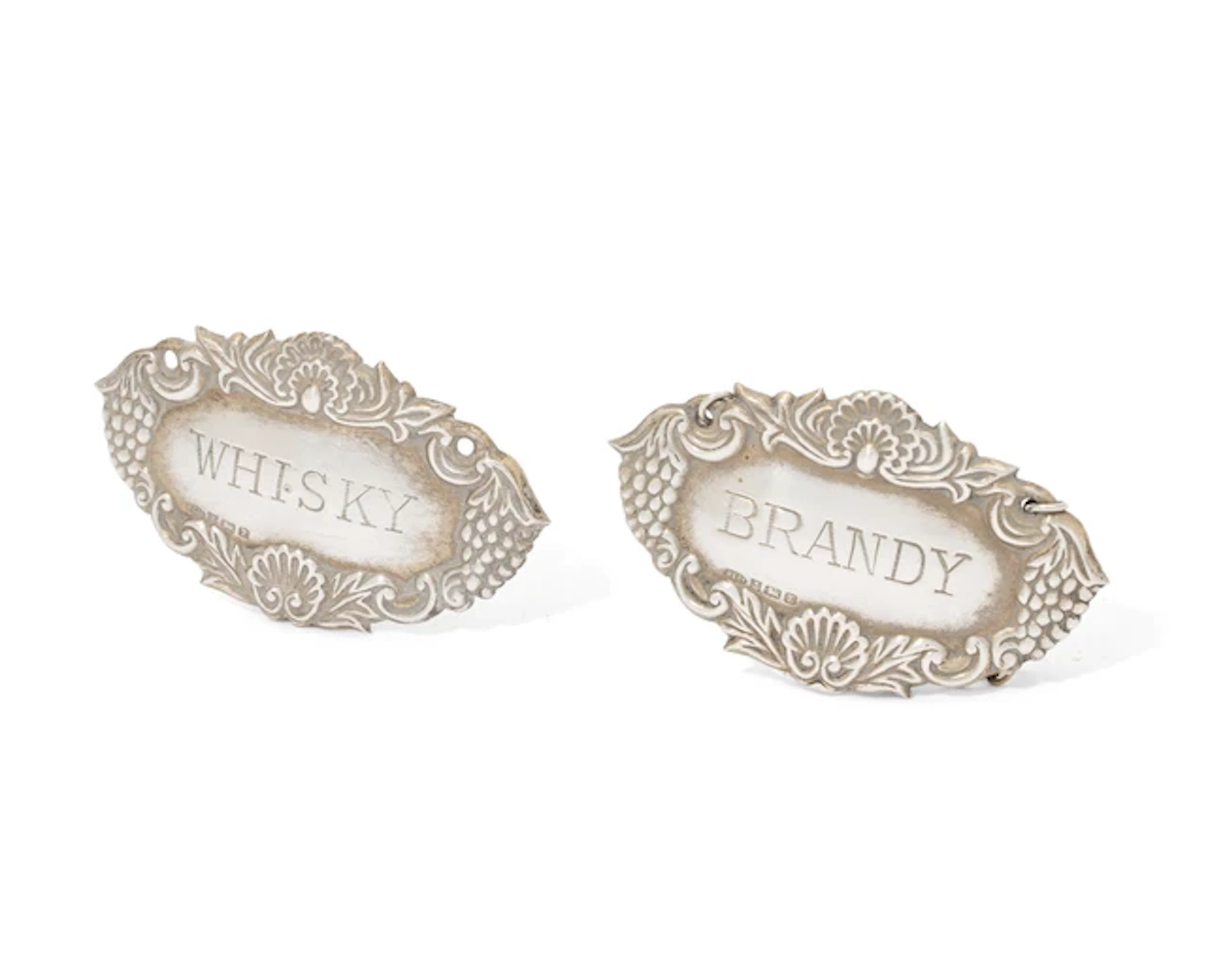 A pair of Elizabeth II silver decanter labels
