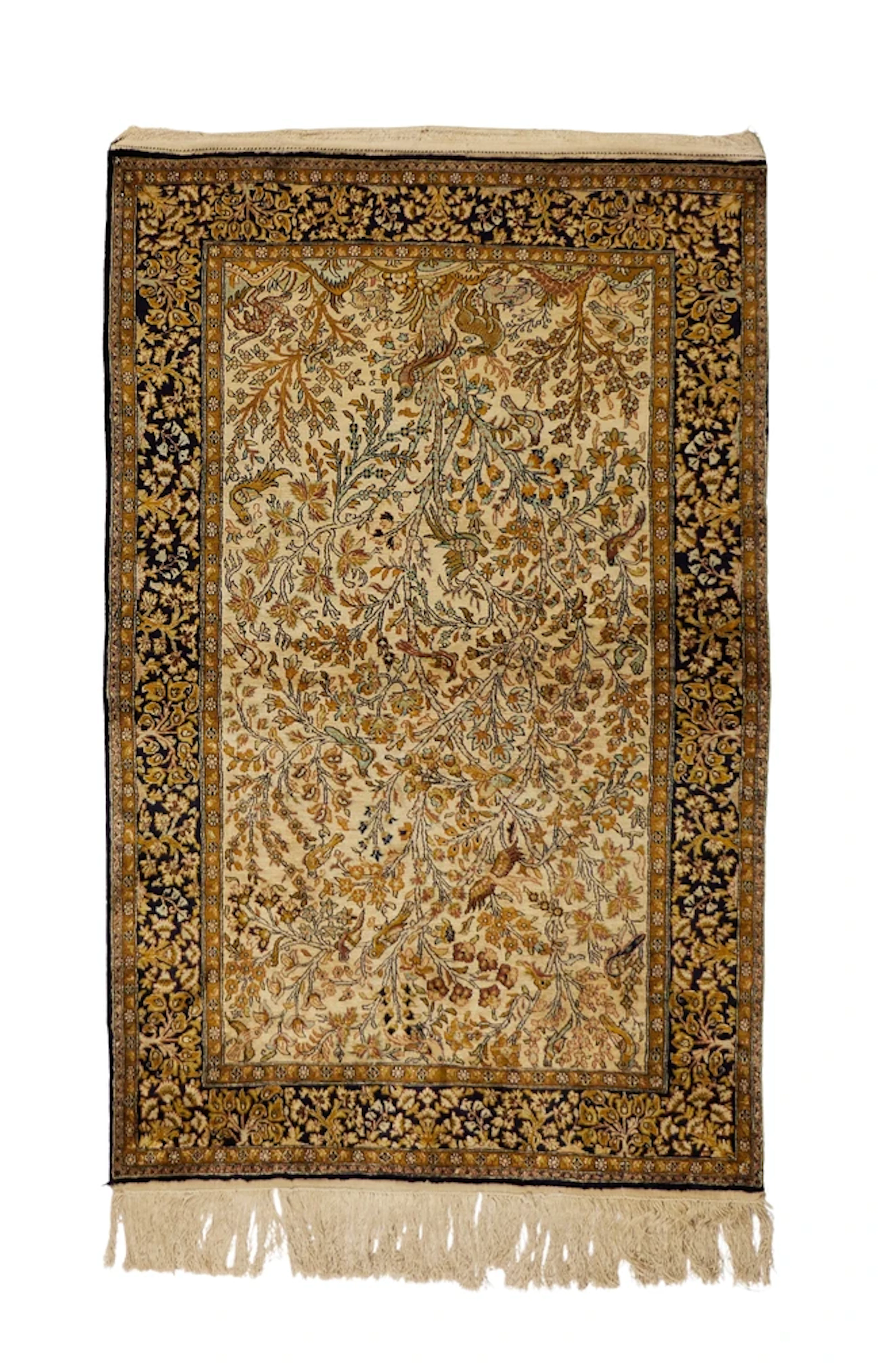 A Persian silk Qum rug