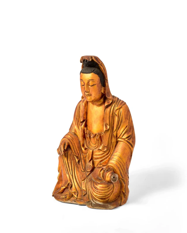 A Japanese gilt-lacquered figure of Kannon Meiji period...