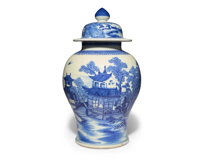 A large Chinese blue and white 'landscape' jar and cover...