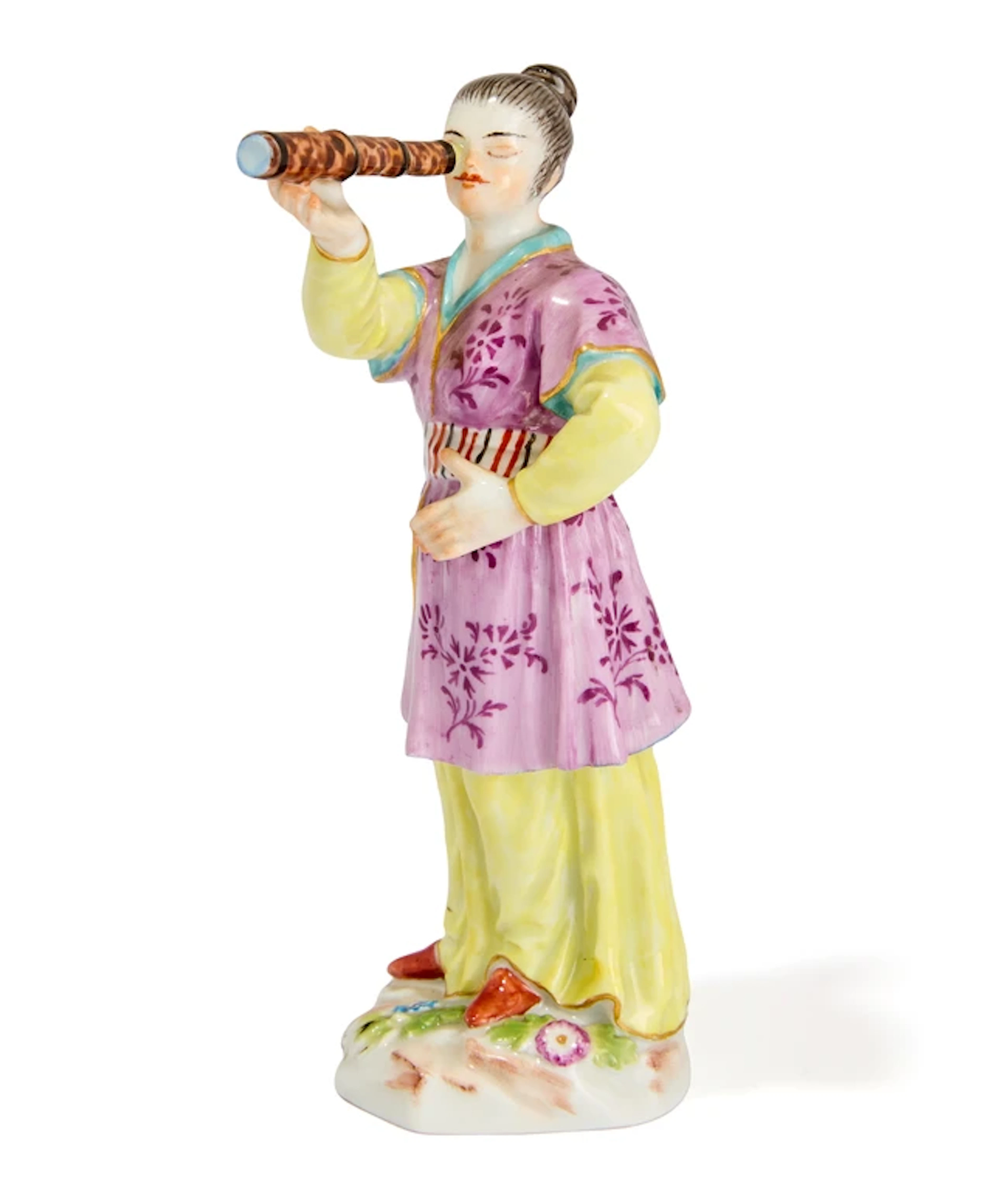 A Meissen porcelain figure of a Japanese woman with a telescope