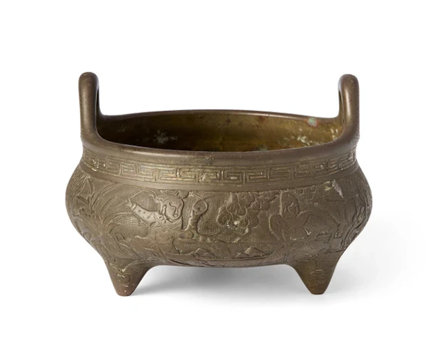 A Chinese bronze 'lotus' tripod incense burner Qing dynasty