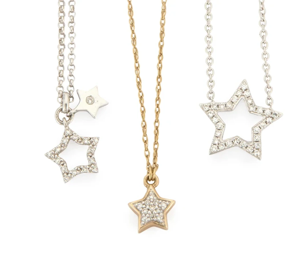 Three 9ct gold star pendant necklaces