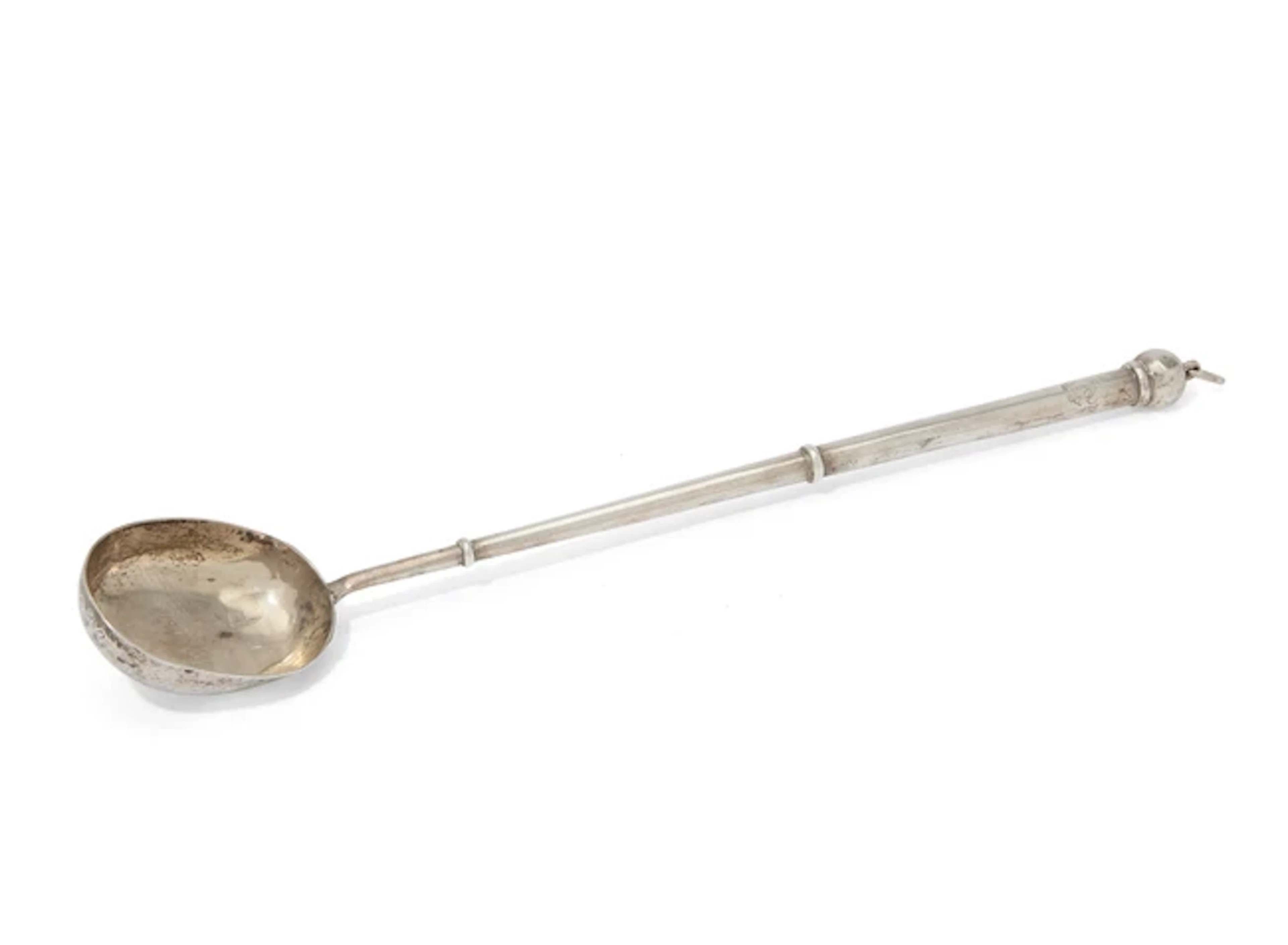 An early George II silver canon-handled basting spoon