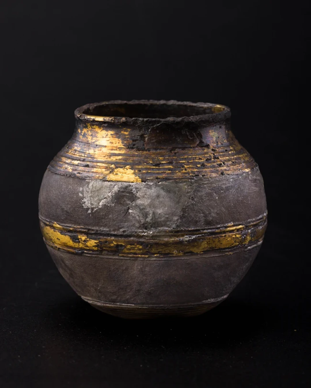 A silver-gilt spherical beaker