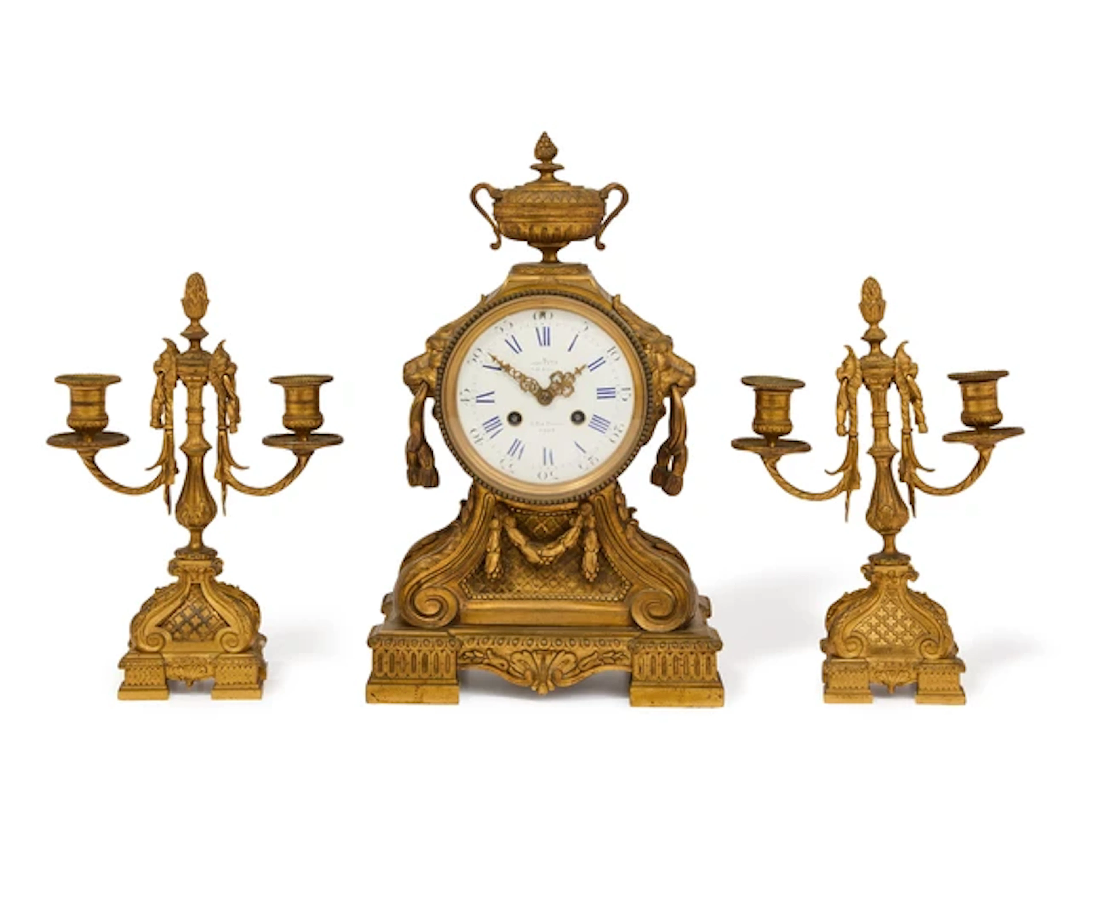 A French gilt-bronze clock garniture