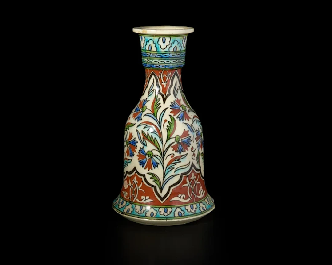A bell-shaped pottery huqqa base