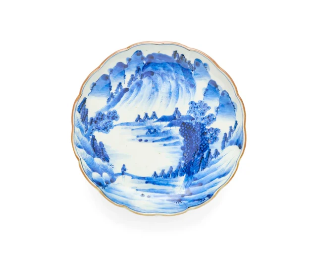 A Japanese Arita blue and white floral-rimmed dish Edo period