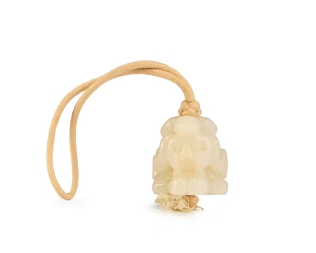 A Chinese white jade 'three boys' carving Qing dynasty