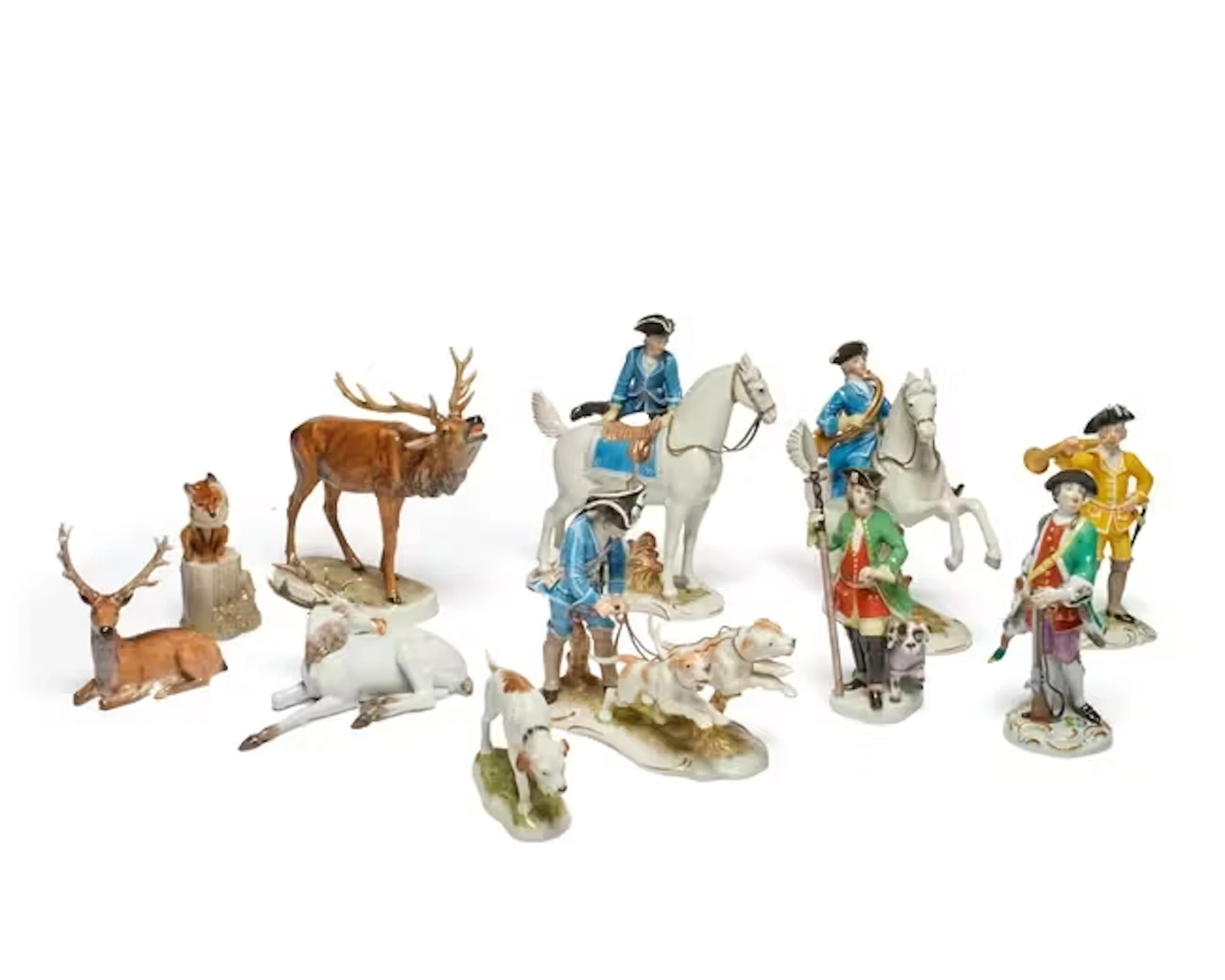 A group of Meissen and Nymphenburg porcelain hunting subject figures