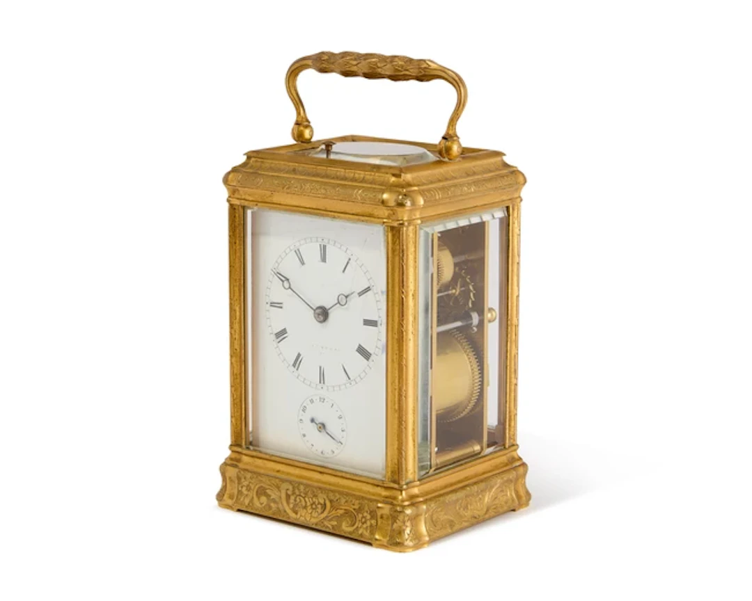 A French brass repeating carriage clock with alarm