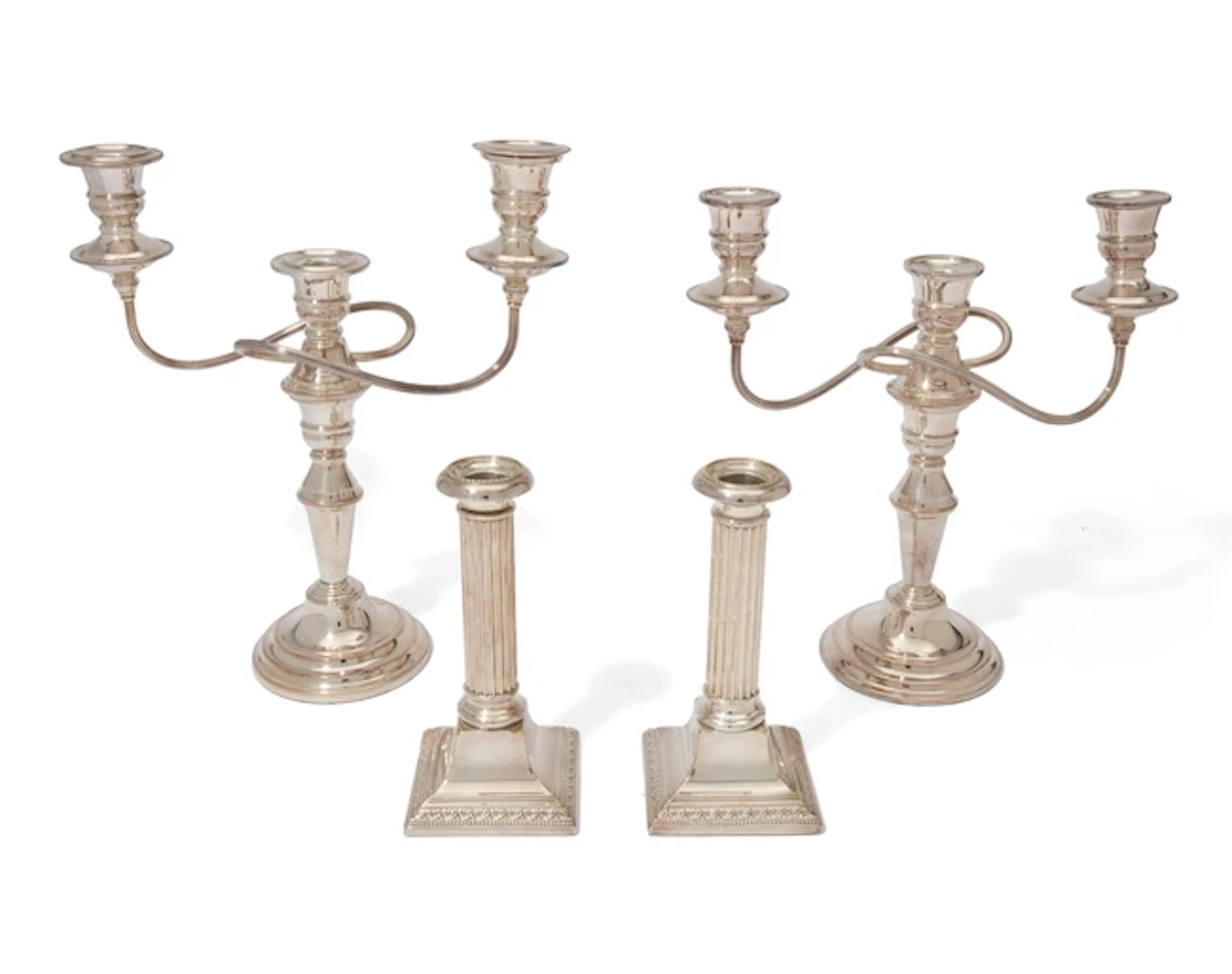 A pair of convertible silver-plated candelabra