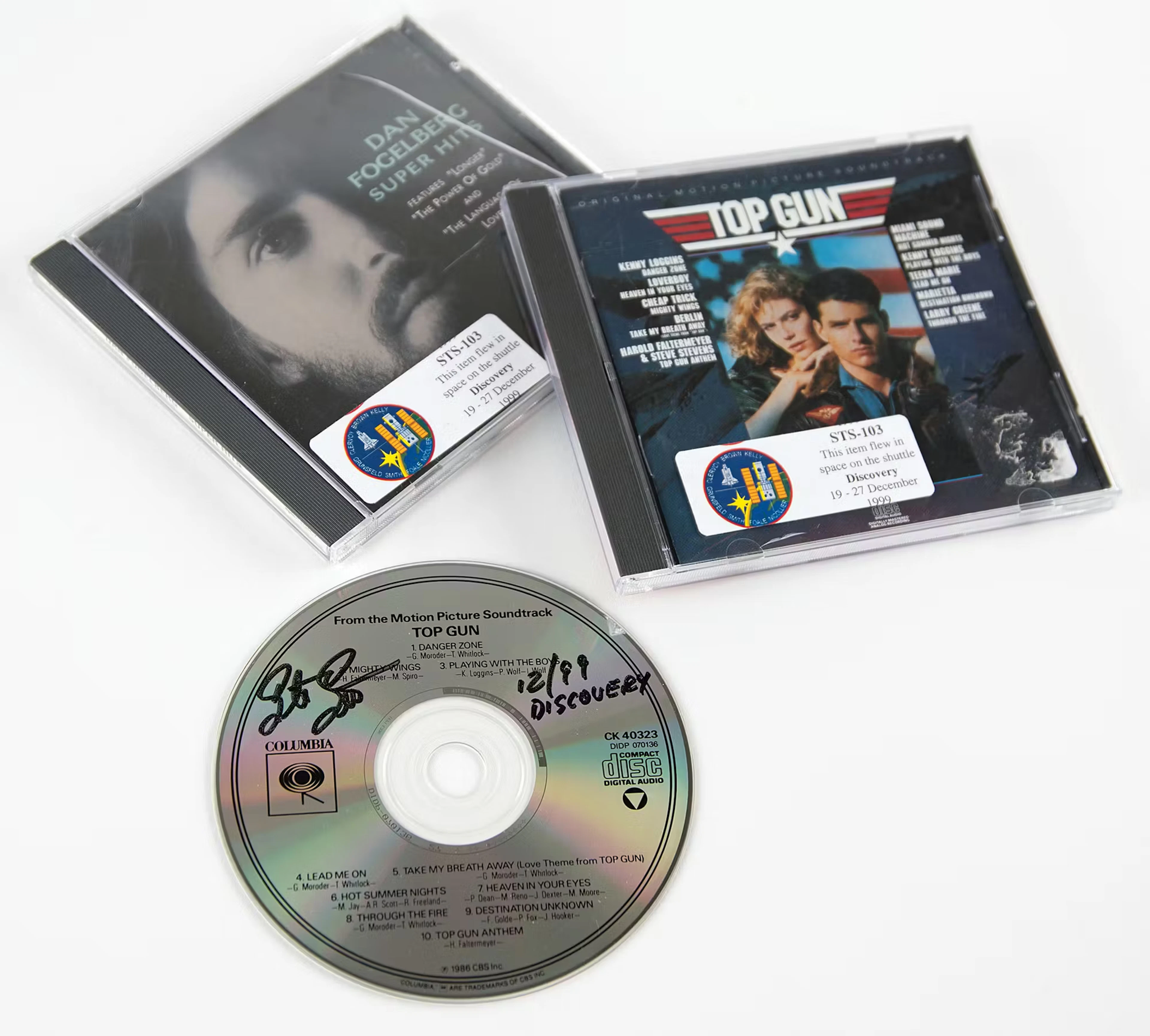 STS-103 Flown CDs (2) - Top Gun Soundtrack and Dan Fogelberg Super