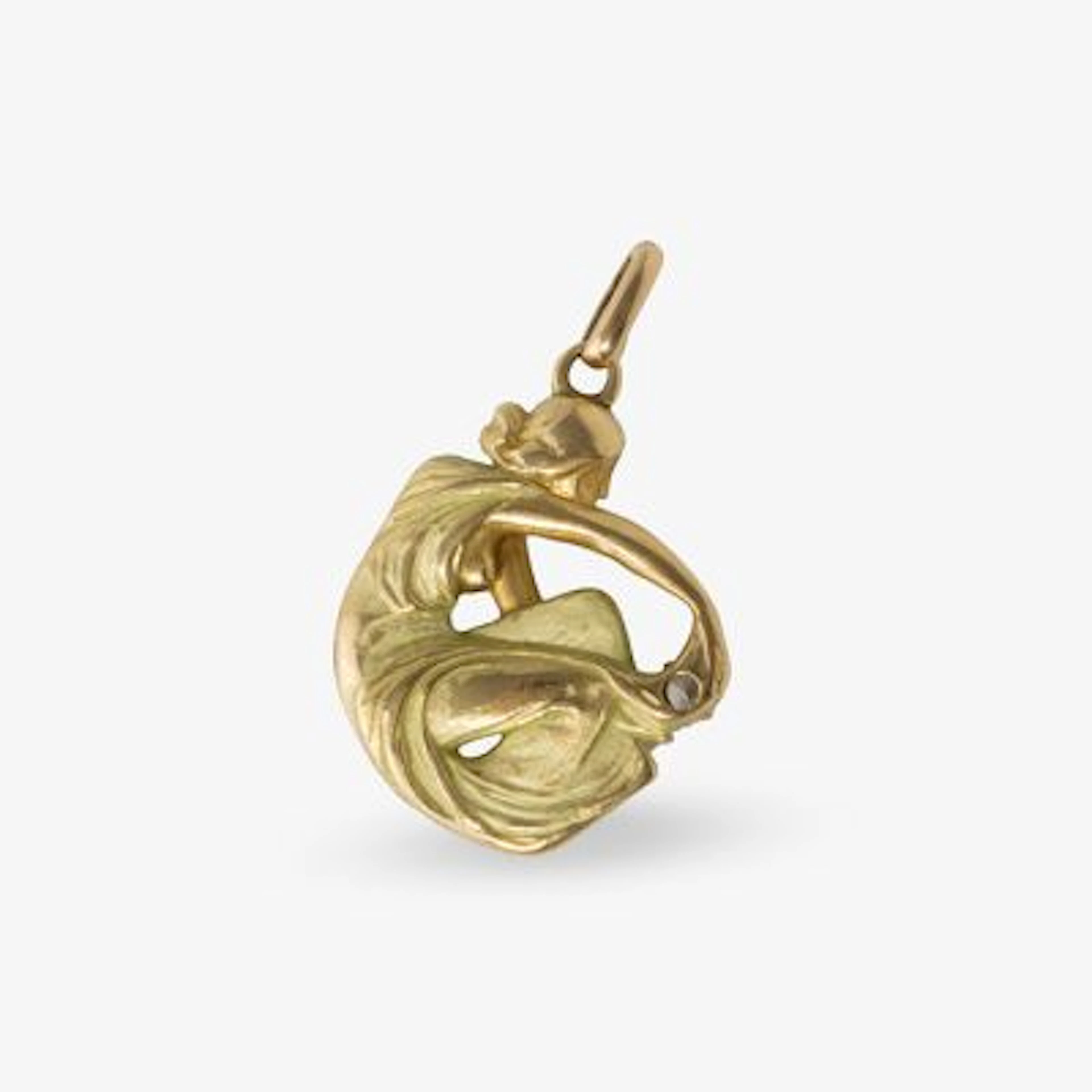Medalla de estilo modernista en oro con diamante