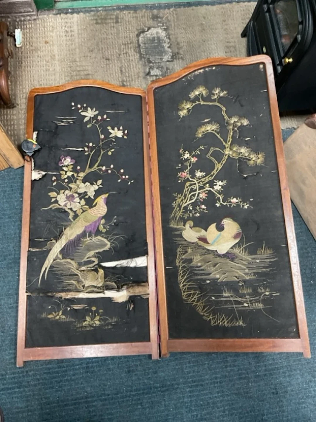 A two-fold late C19th Japanese embroidered screen, the arched panels