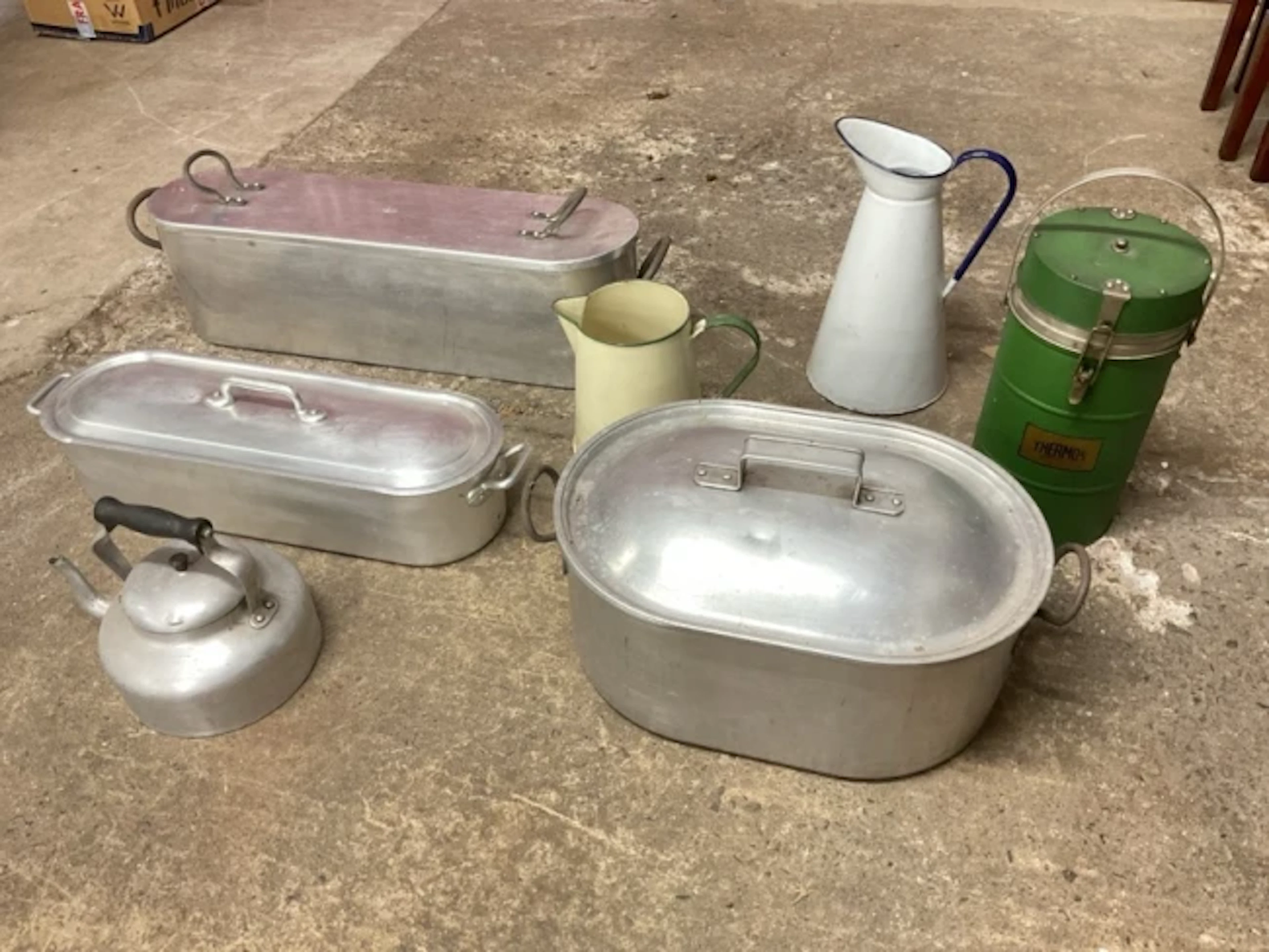 Three rectangular rounded fish kettles with interior drainers and