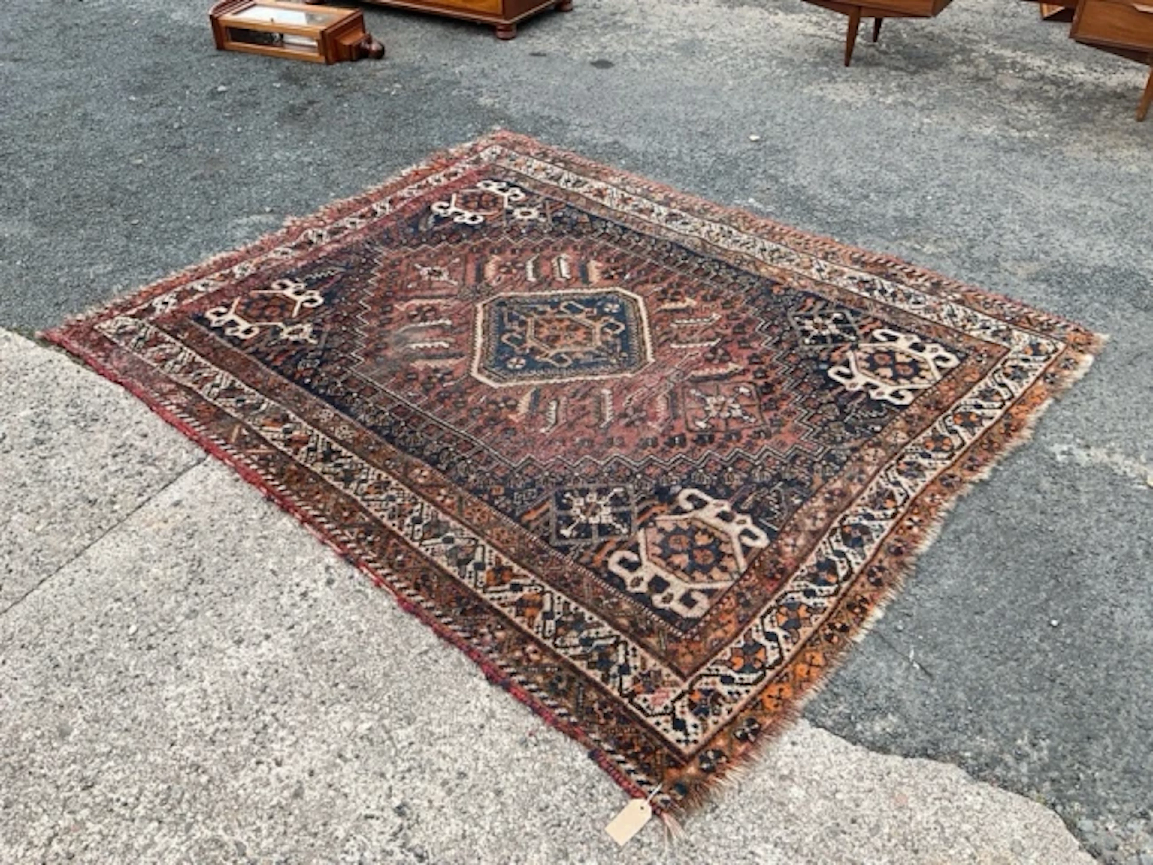A Heriz wool rug with octagonal medallion and conforming spandrels