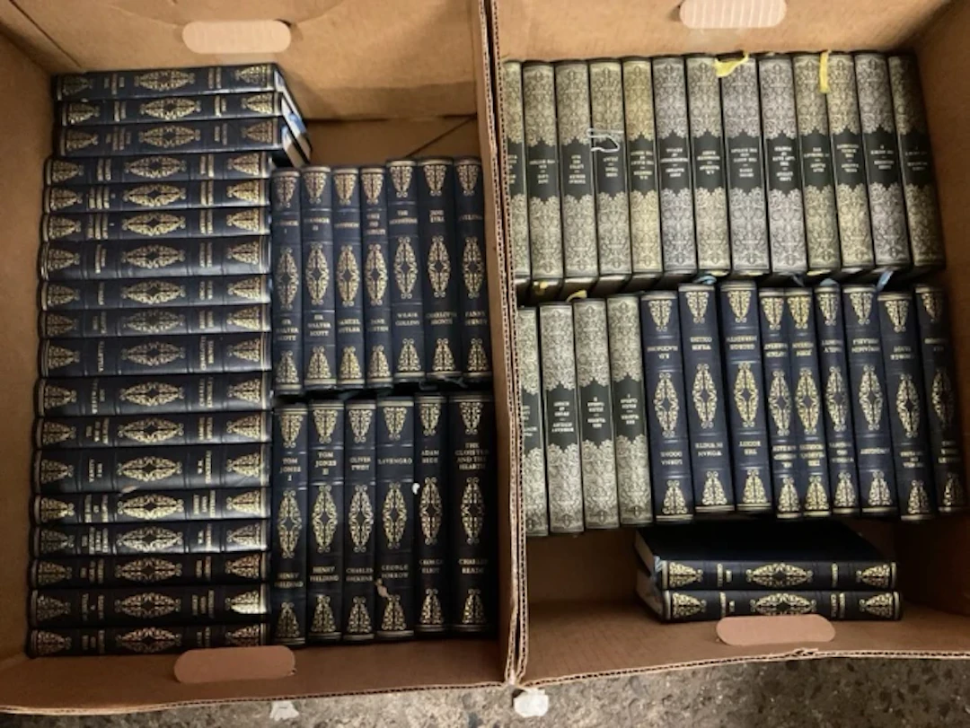 A run of fourty-two leather bound Heron classic illustrated volumes