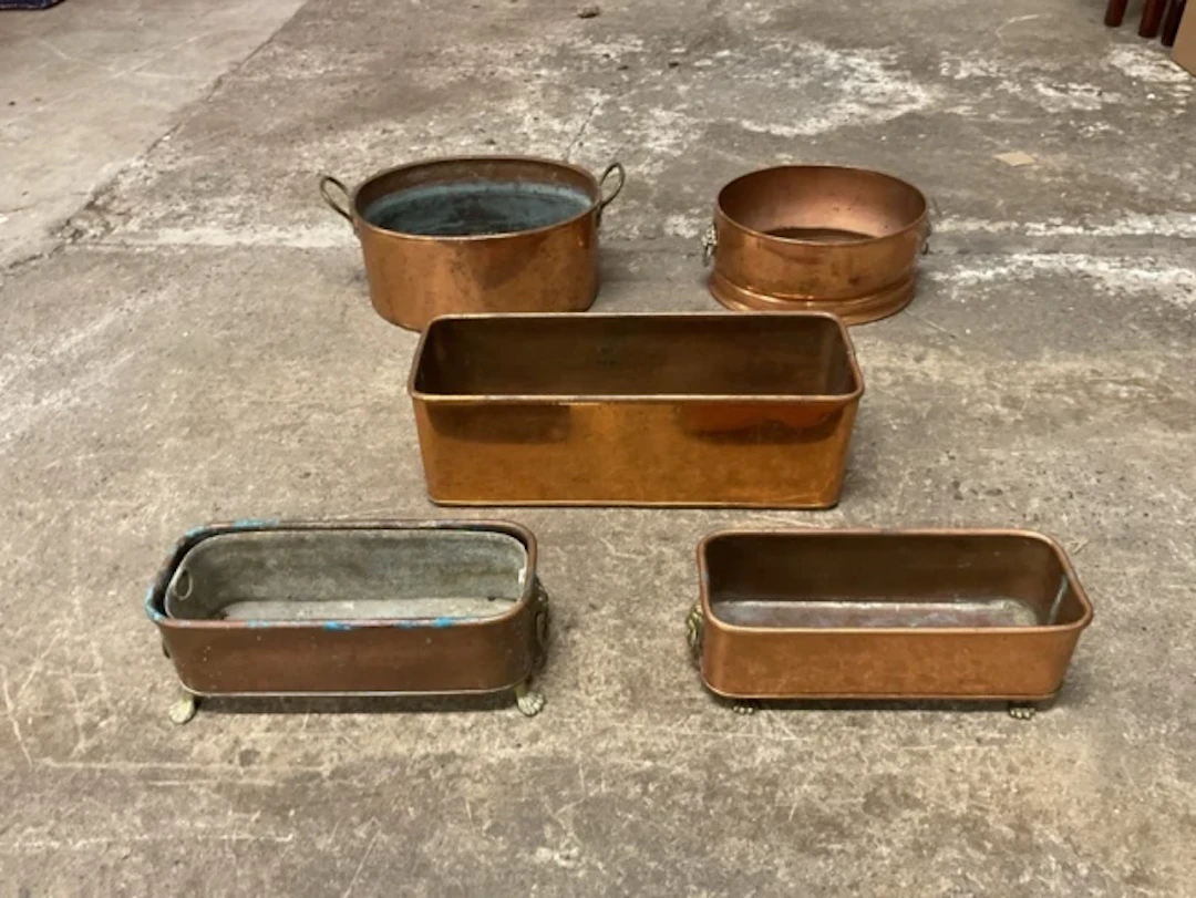 Five miscellaneous copper flower containers- rectangular, lionmask