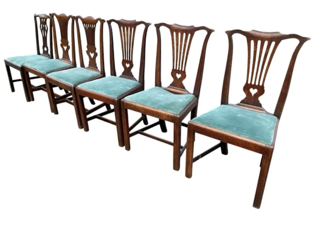 An assembled set of six Georgian Chippendale style chairs, three oak