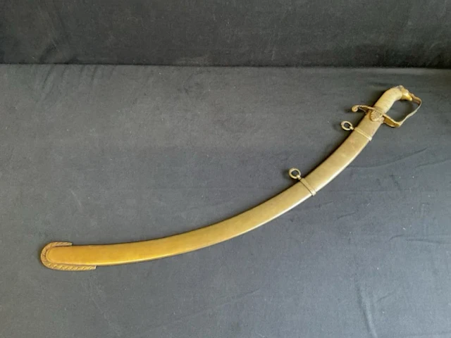 A C19th style officers sabre with brass hilt, horsehead pommel, wire