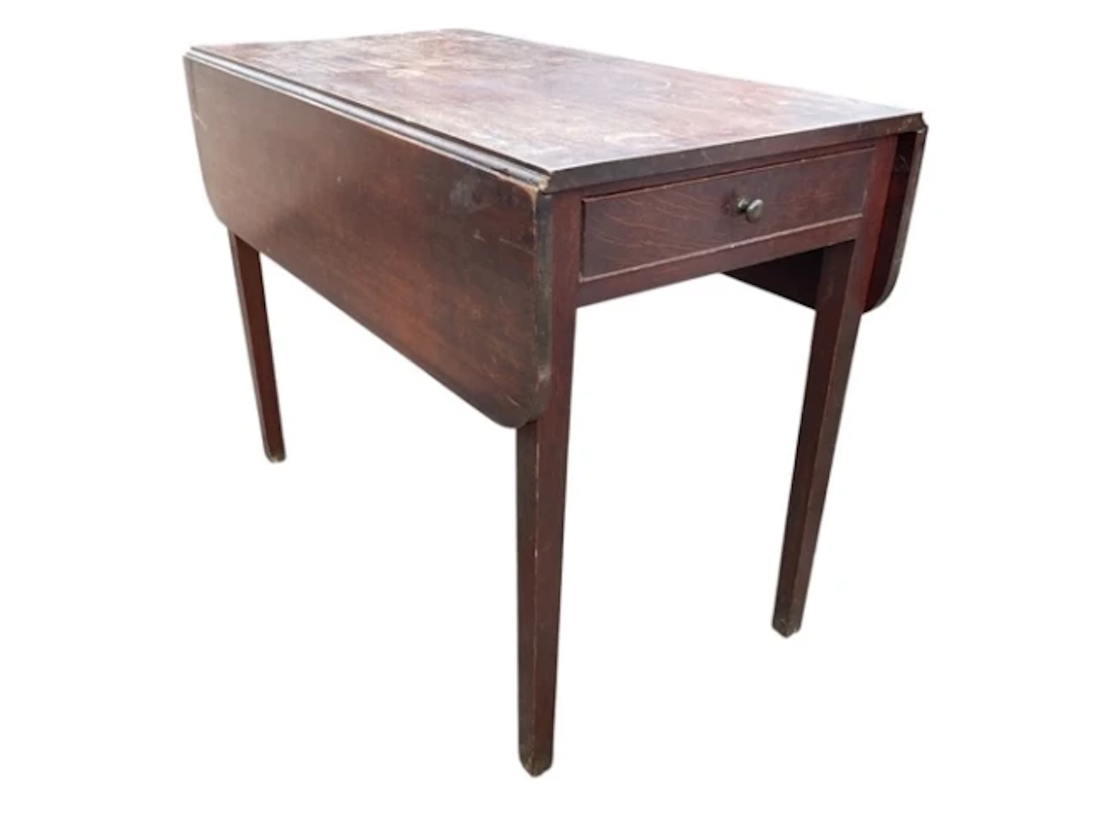 A Georgian mahogany pembroke table, the rectangular top with two leaves