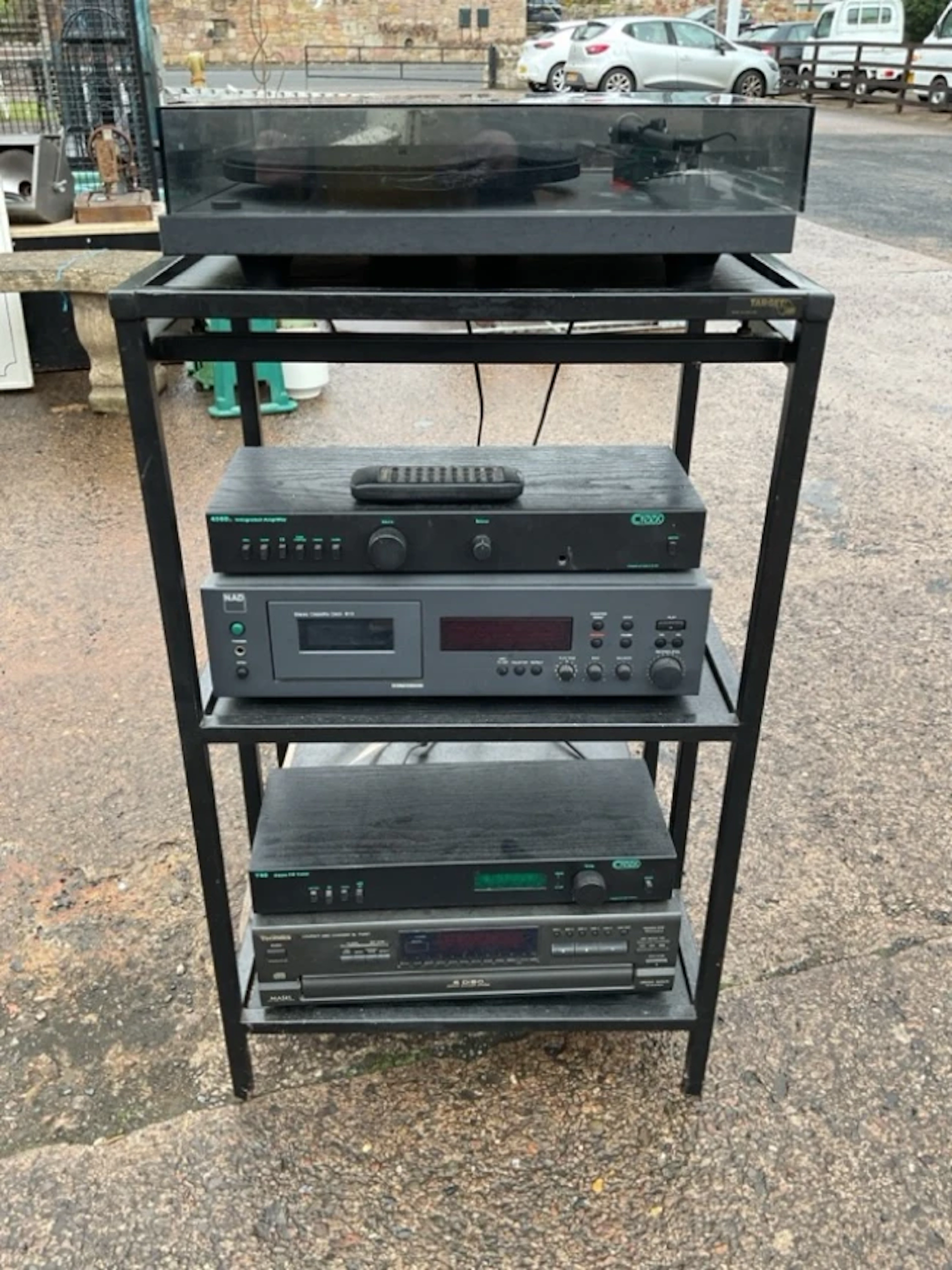 A High-Fi set on tiered equipment stand - a Rega Planar 3 record player