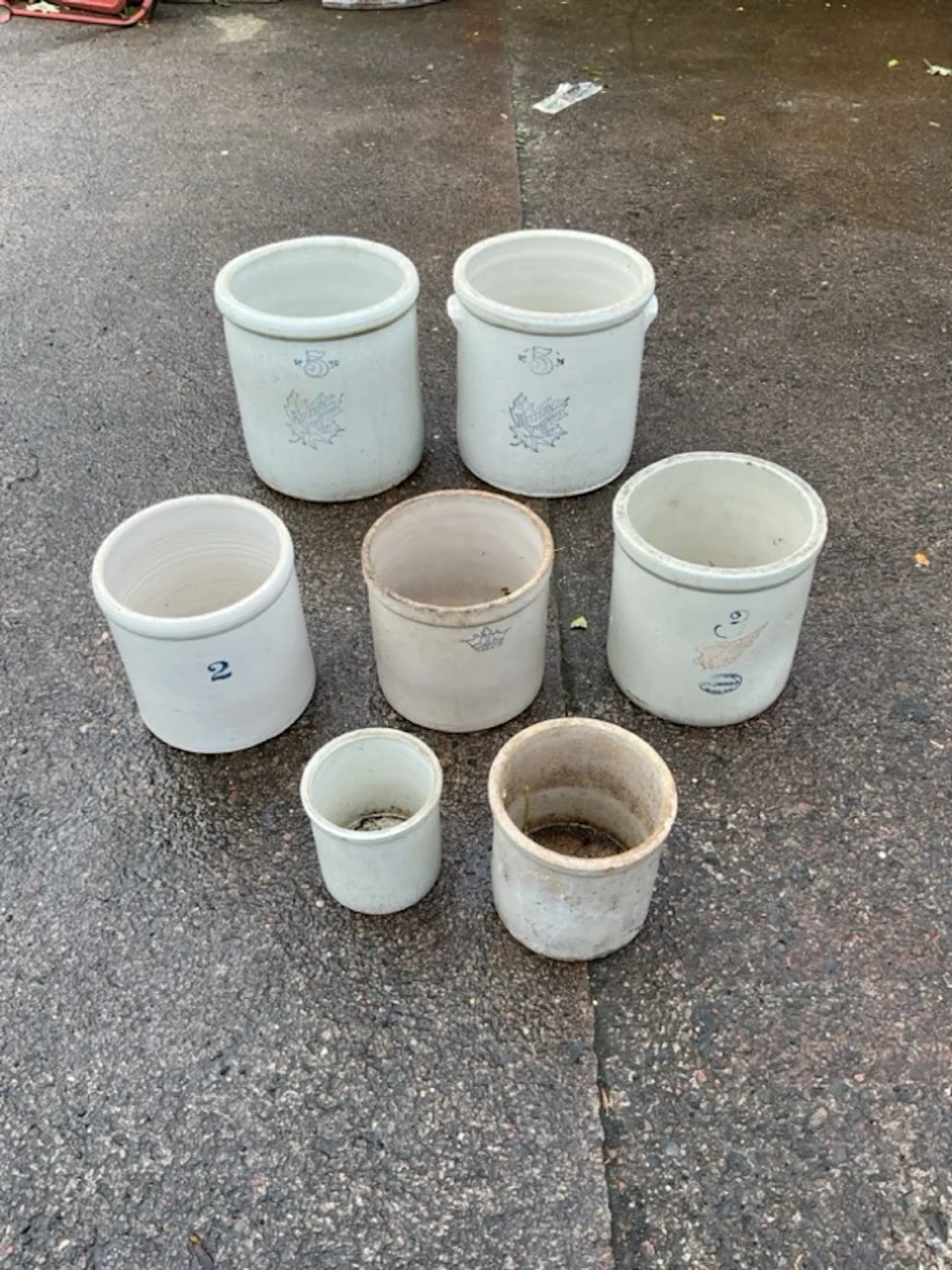 Seven miscellaneous American stoneware tubular pots - some labelled.
