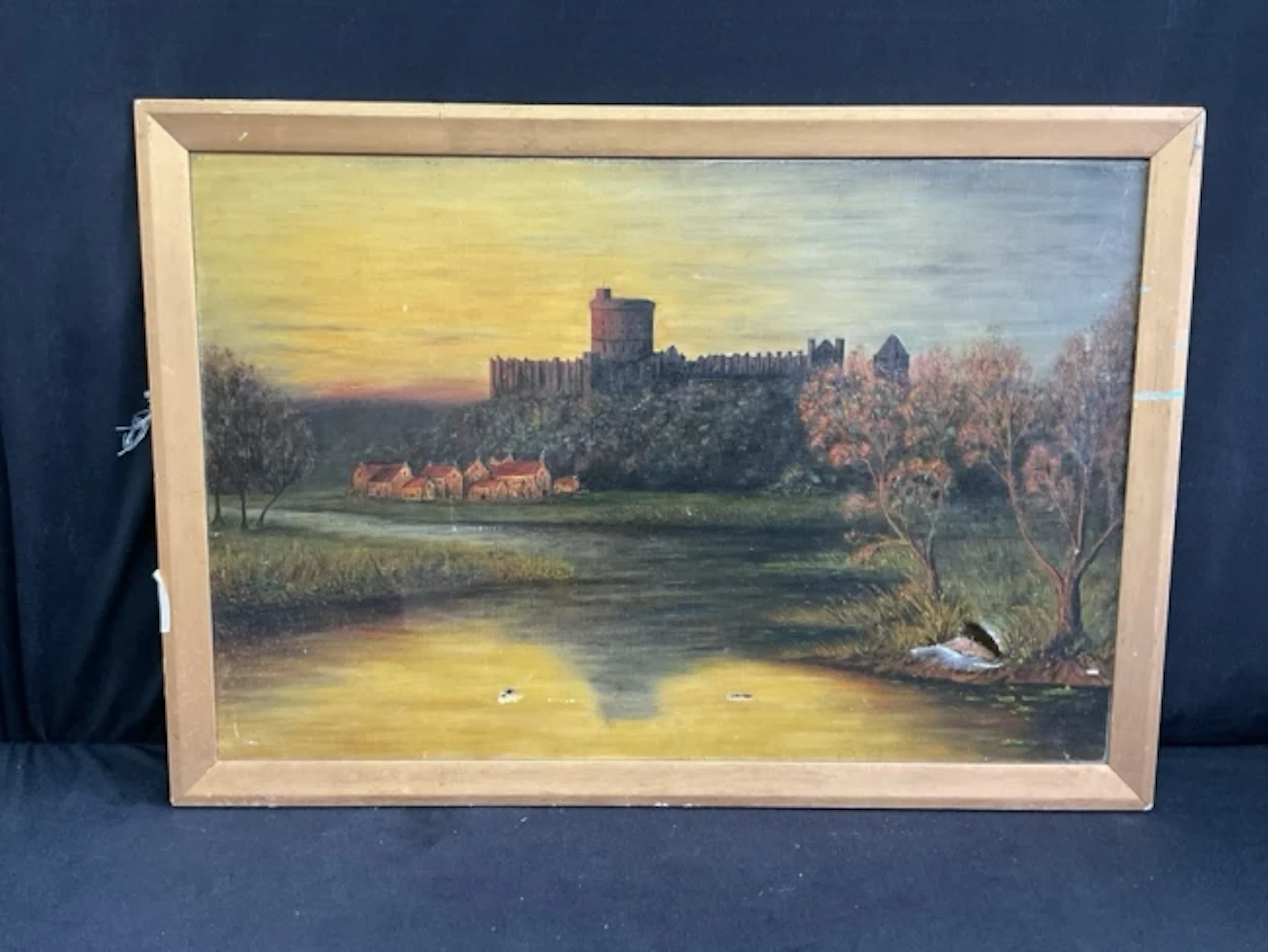 A C19th oil on canvas, view of Windsor Castle from the Thames at dusk