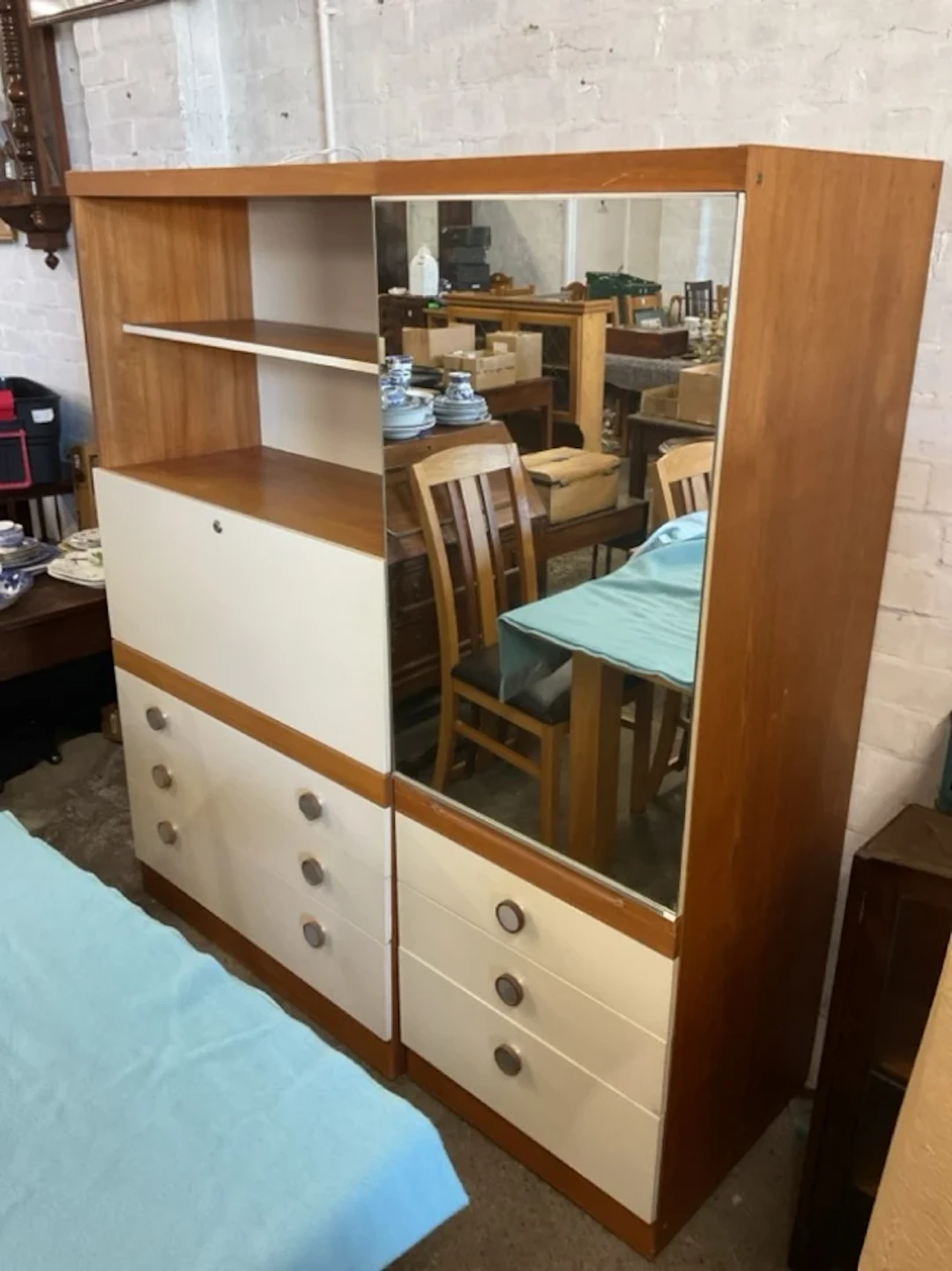 A 70s Schreiber wall unit with shelves, secretaire desk above drawers
