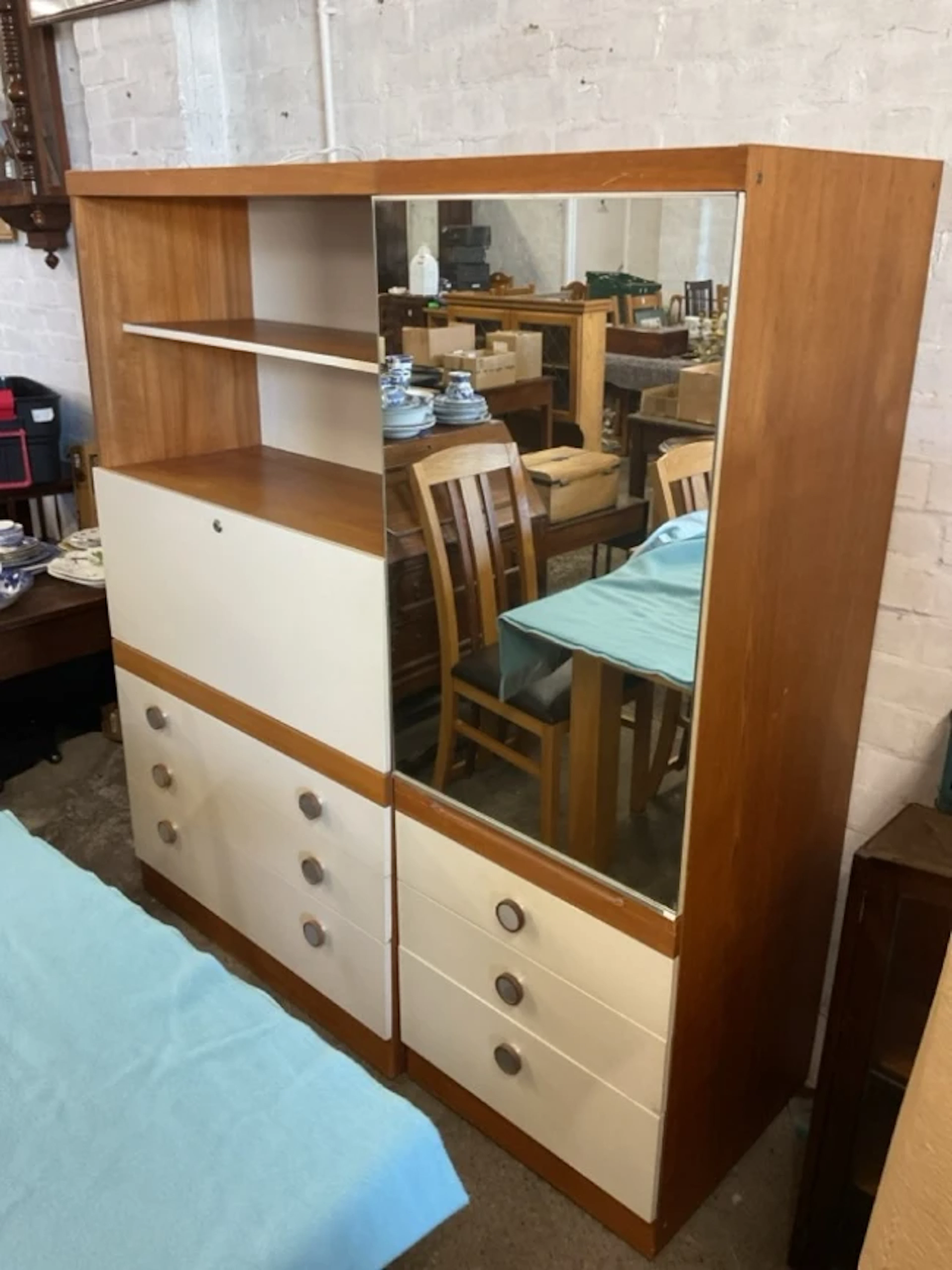 A 70s Schreiber wall unit with shelves, secretaire desk above drawers